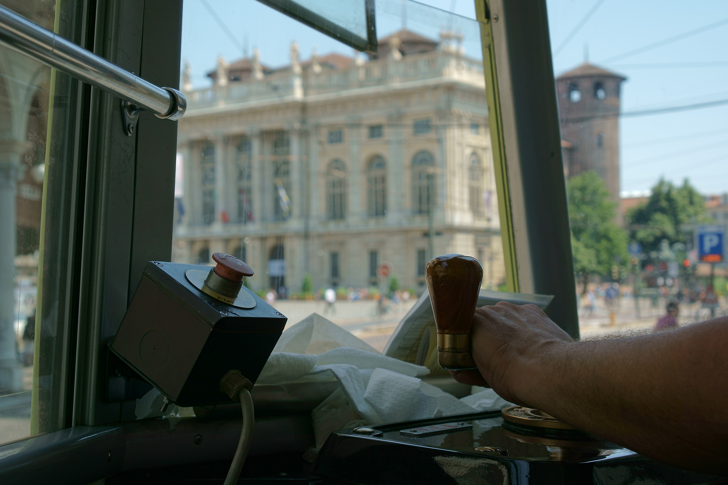 on the tram in Piazza Castello