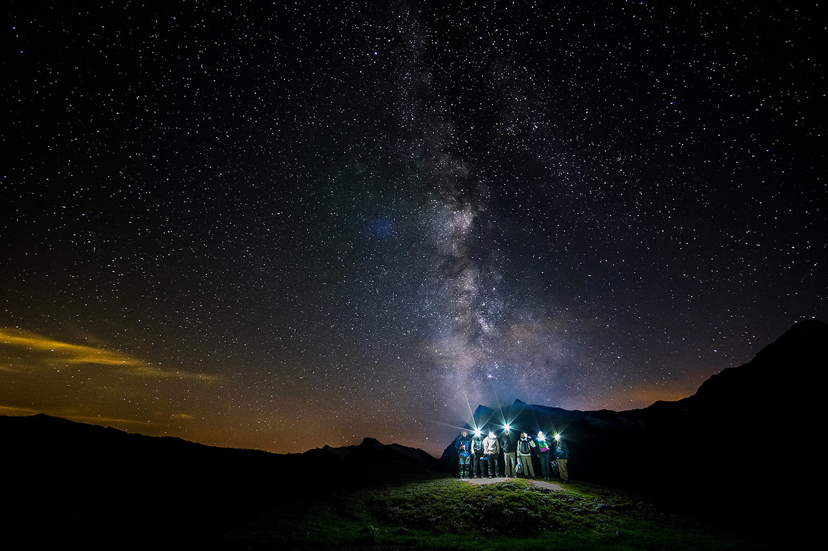 Photographers under the milky way