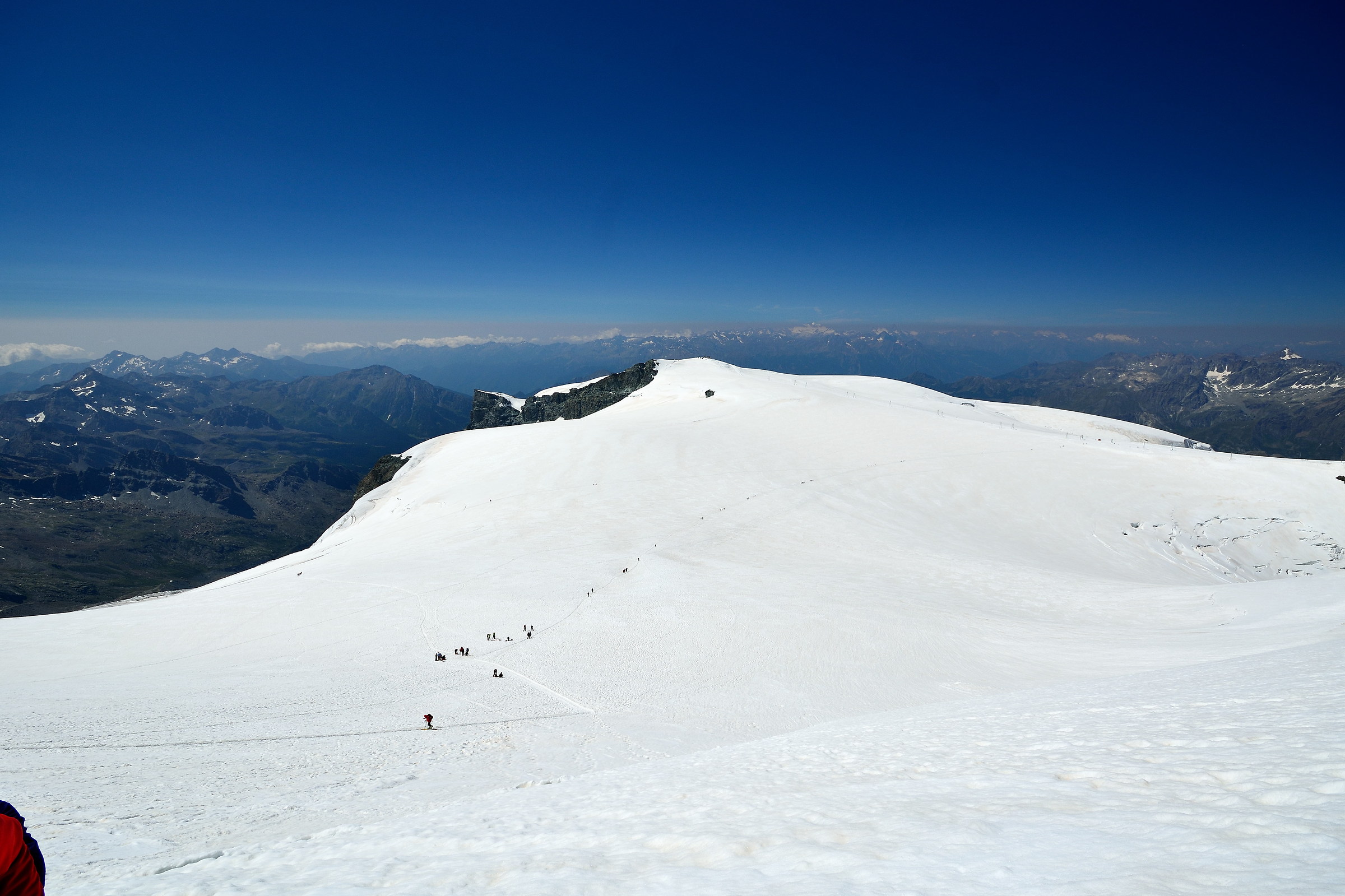 climbing the last traverse to the summit of the Breithorn or