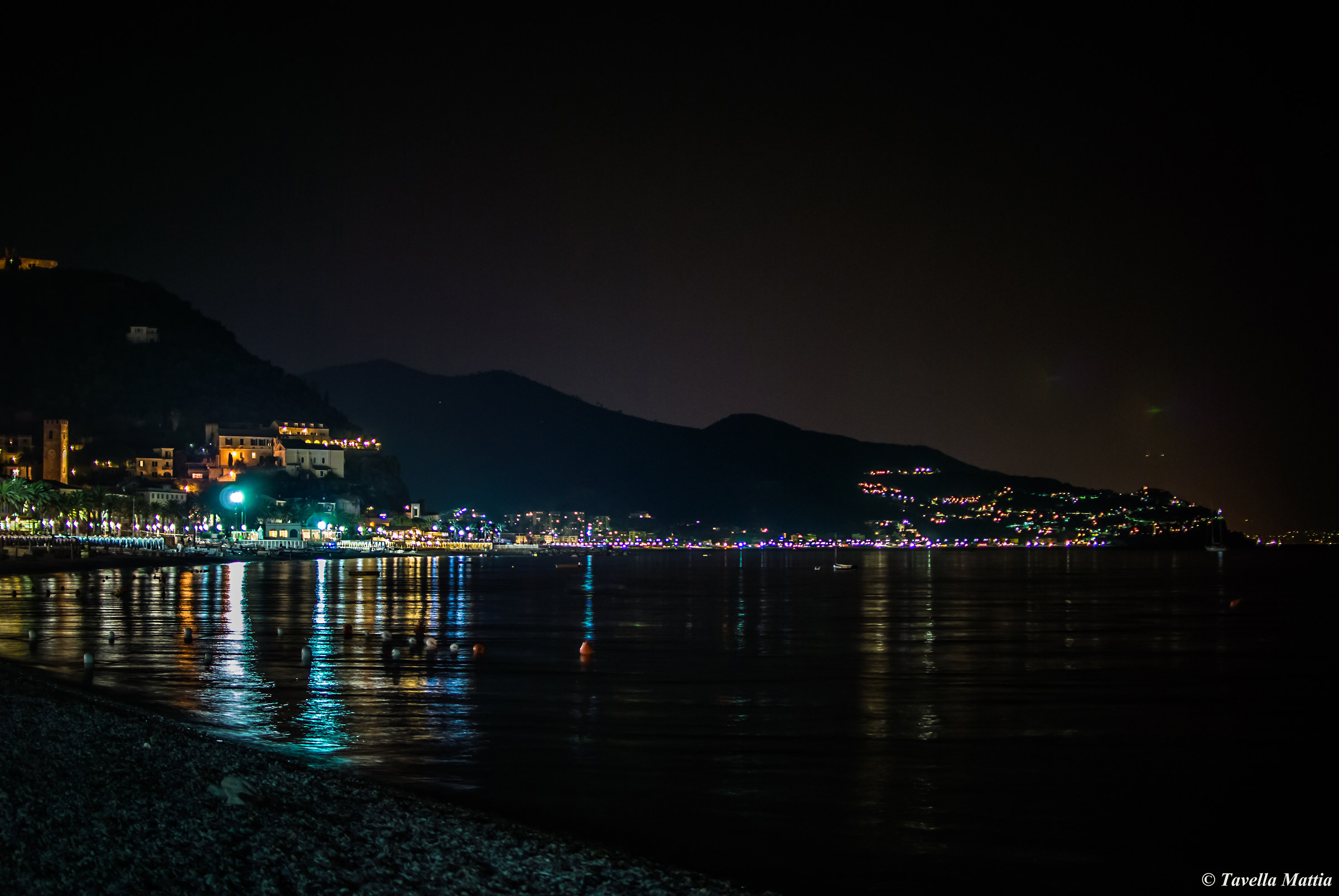 Noli seafront and in the distance Spotorno