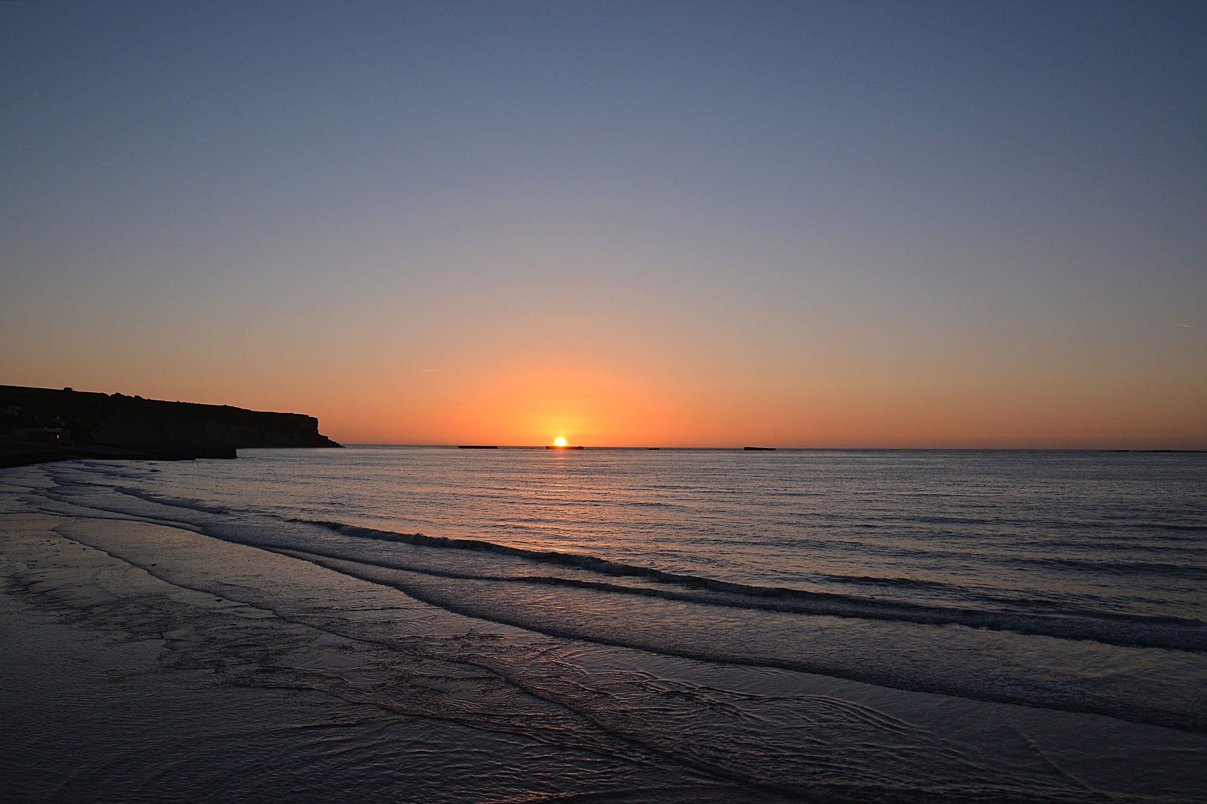 Arromanche  tramonto sulla spiaggia