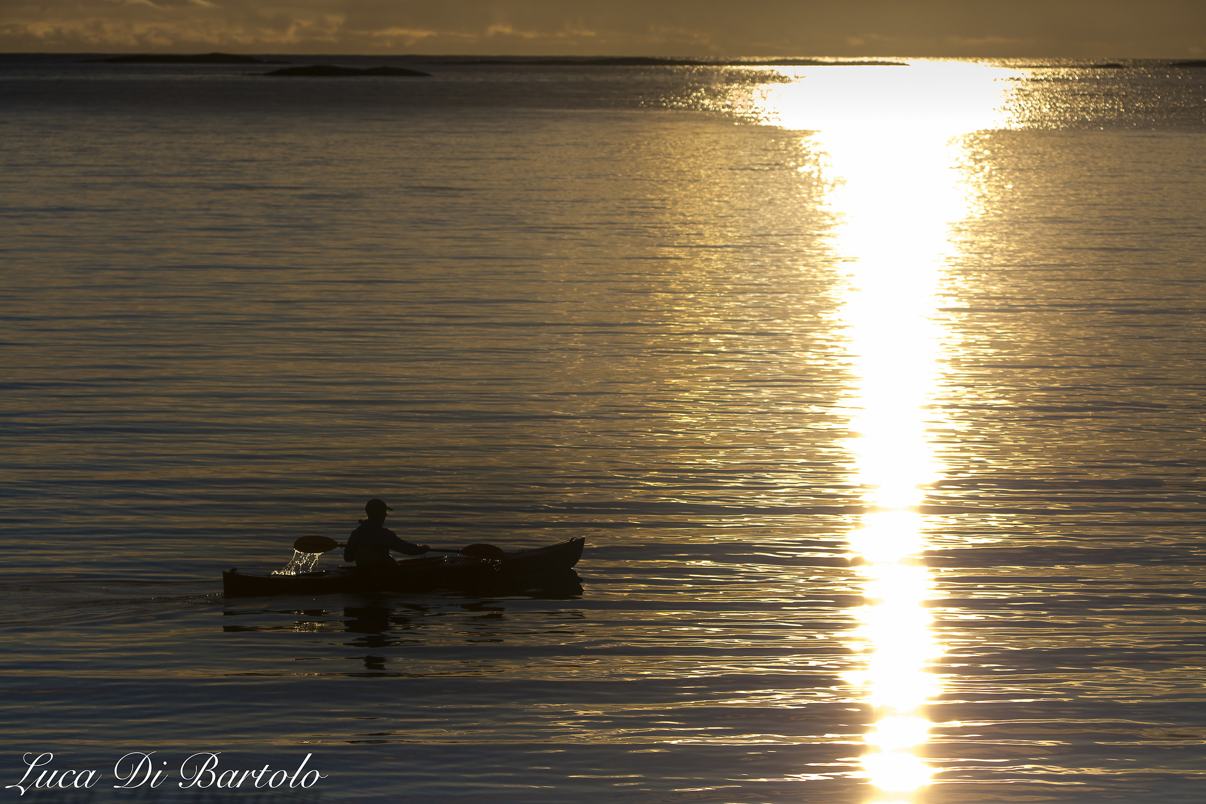 Kayaker backlit (island Andya Norway)