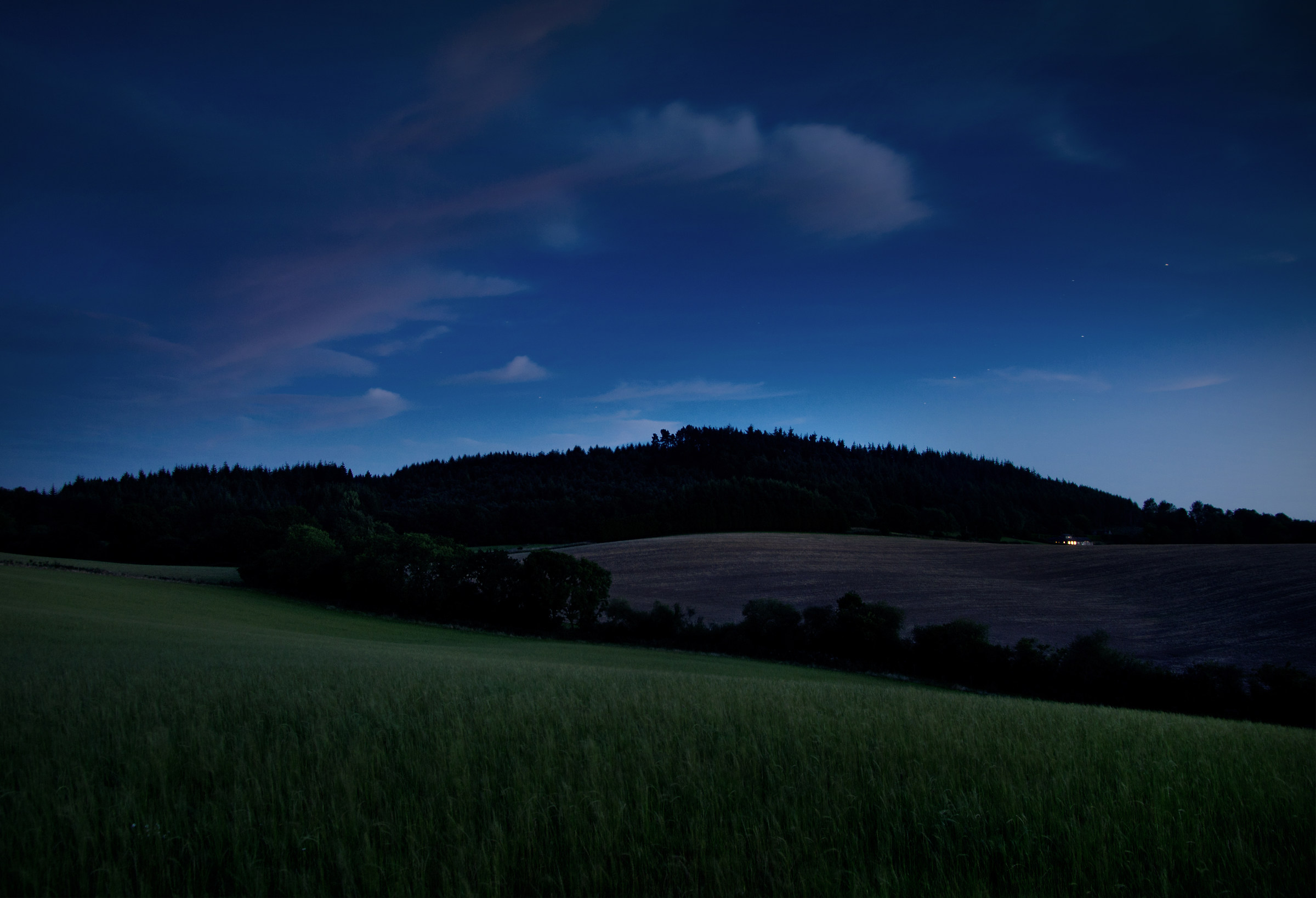 Farmhouse, by the woods, almost Dark