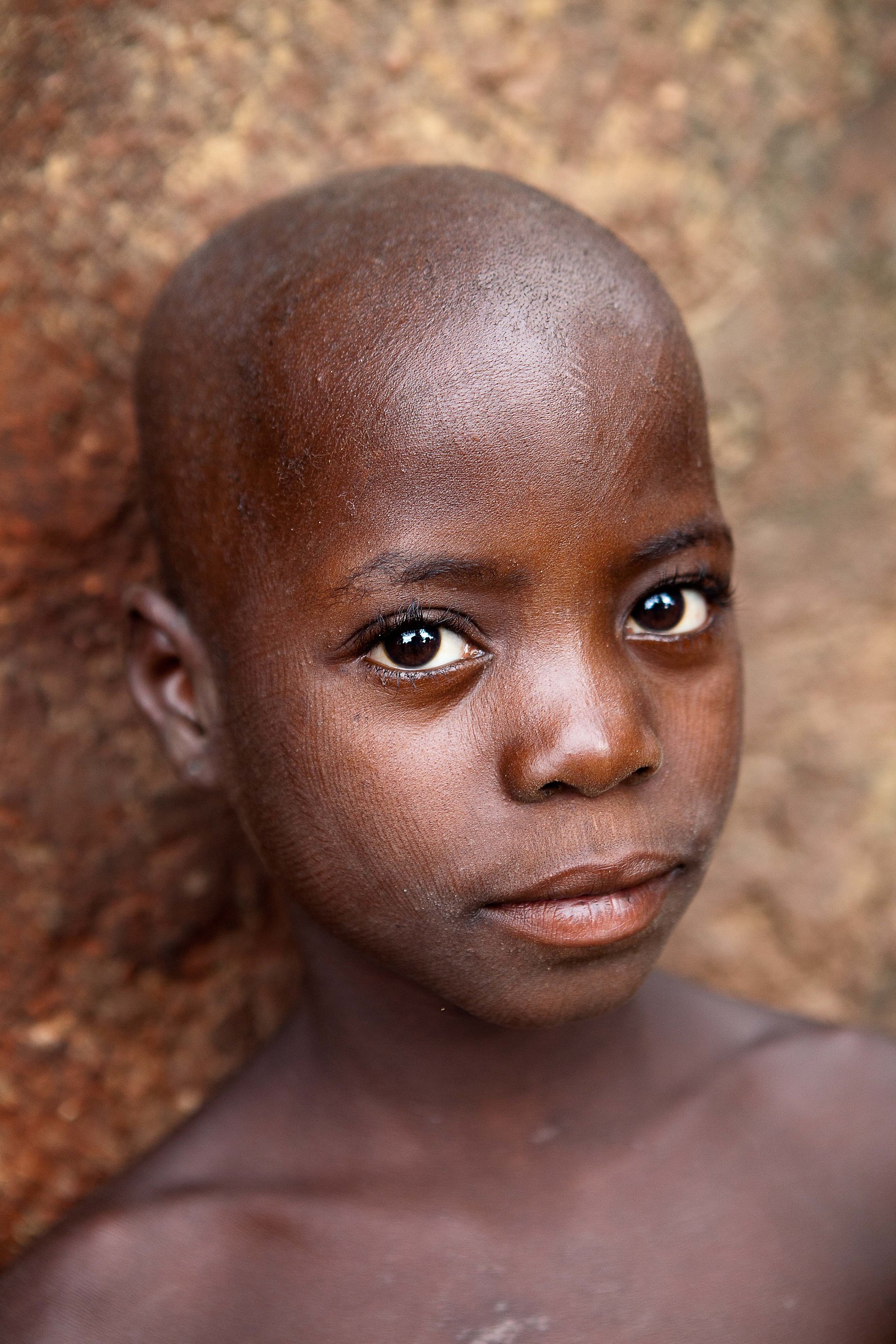 Boy in a village Taneka, Benon Northern
