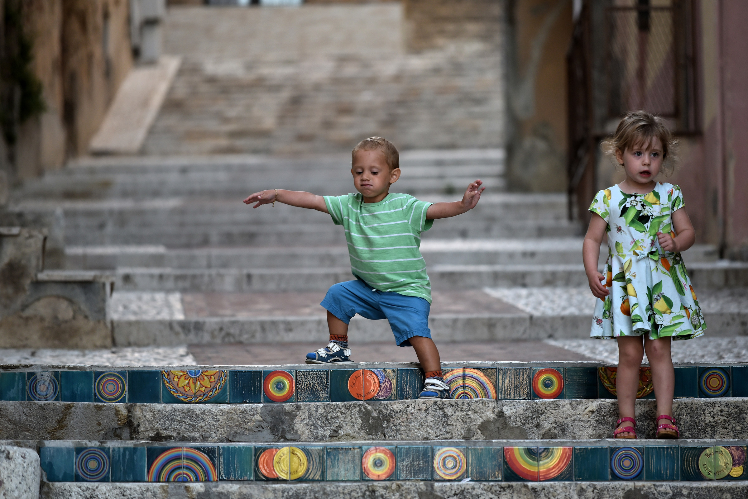 The acrobat and his assistant