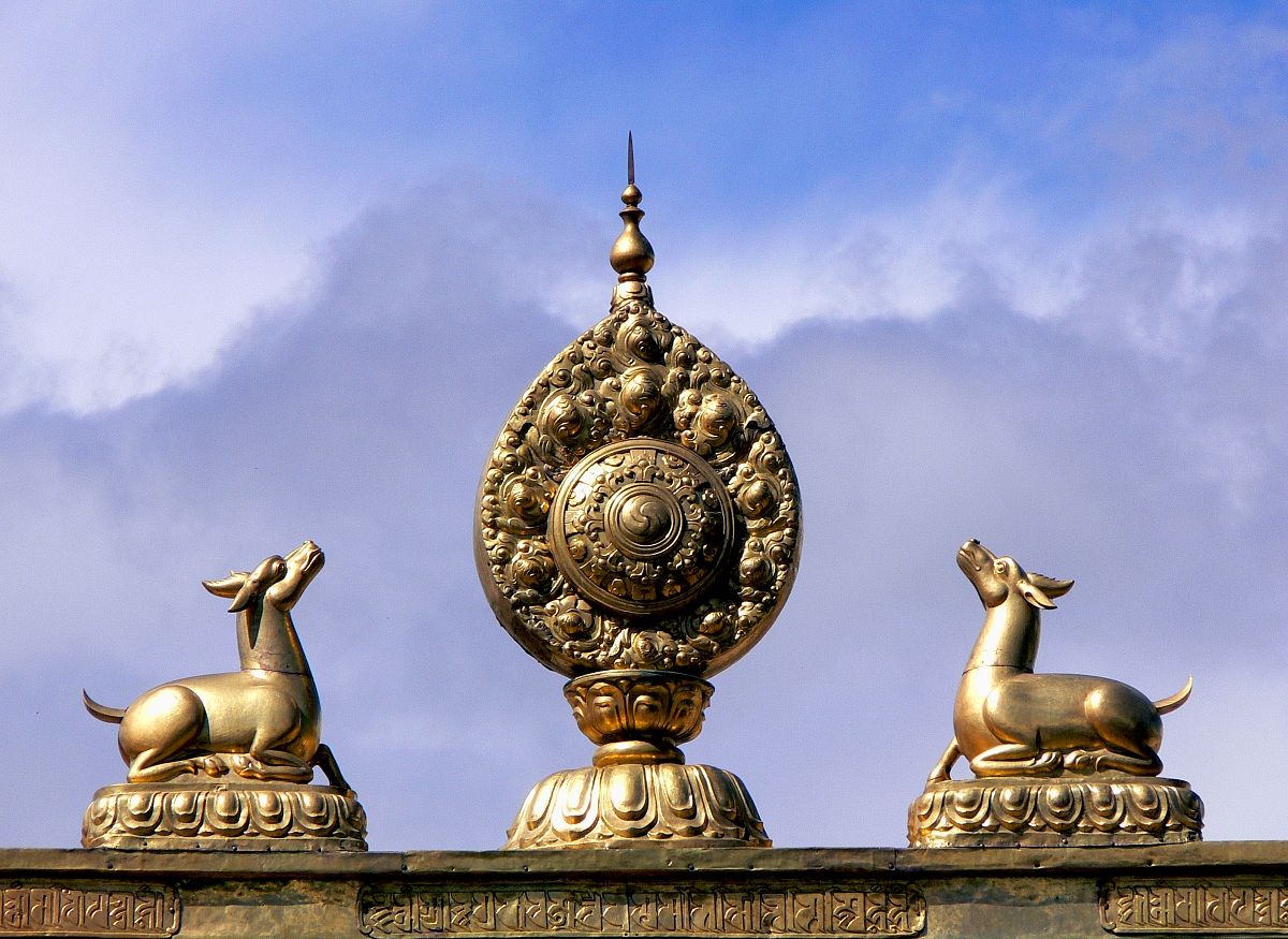 Tibetan Dharma wheel and Deer