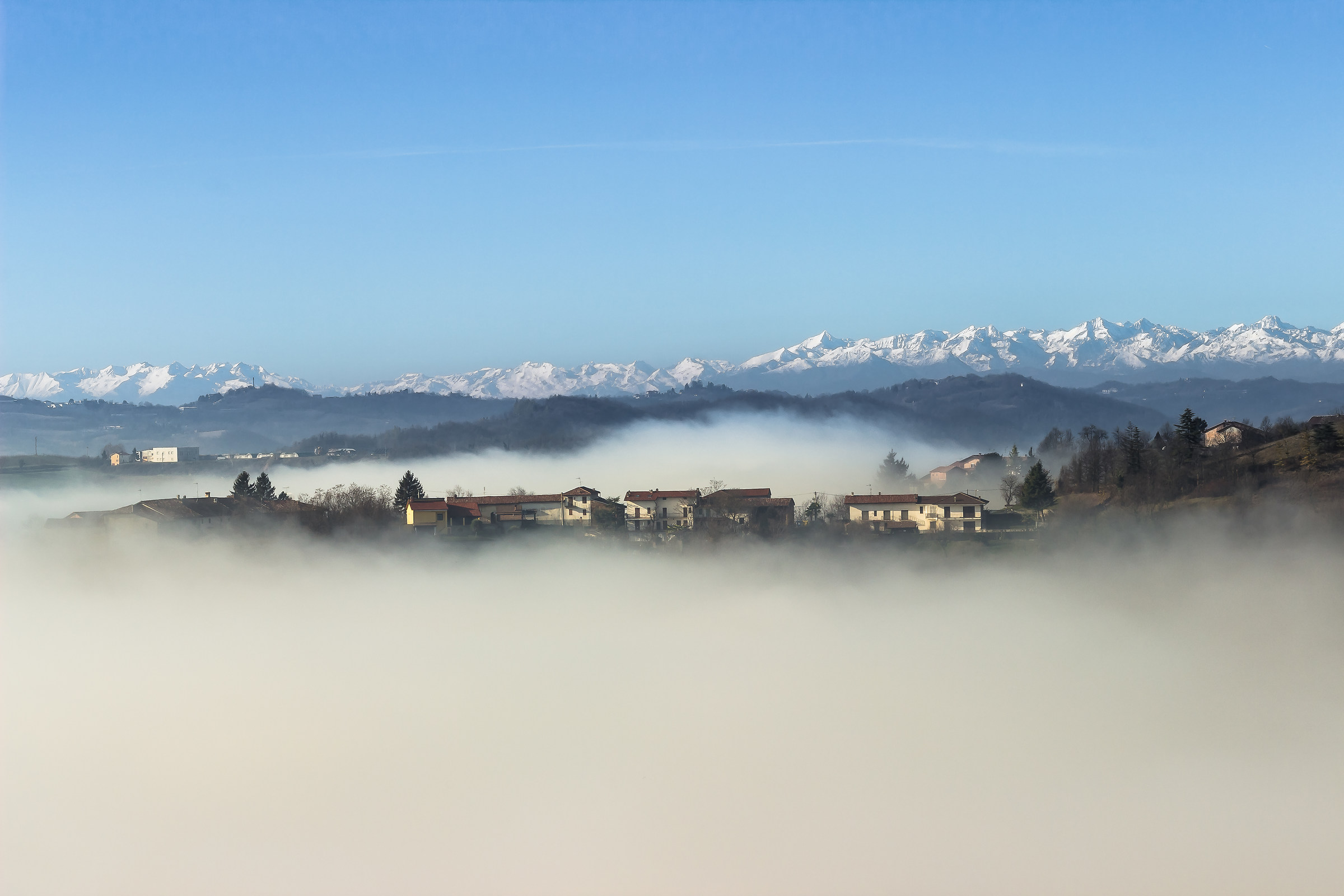 the fog to the steep hills