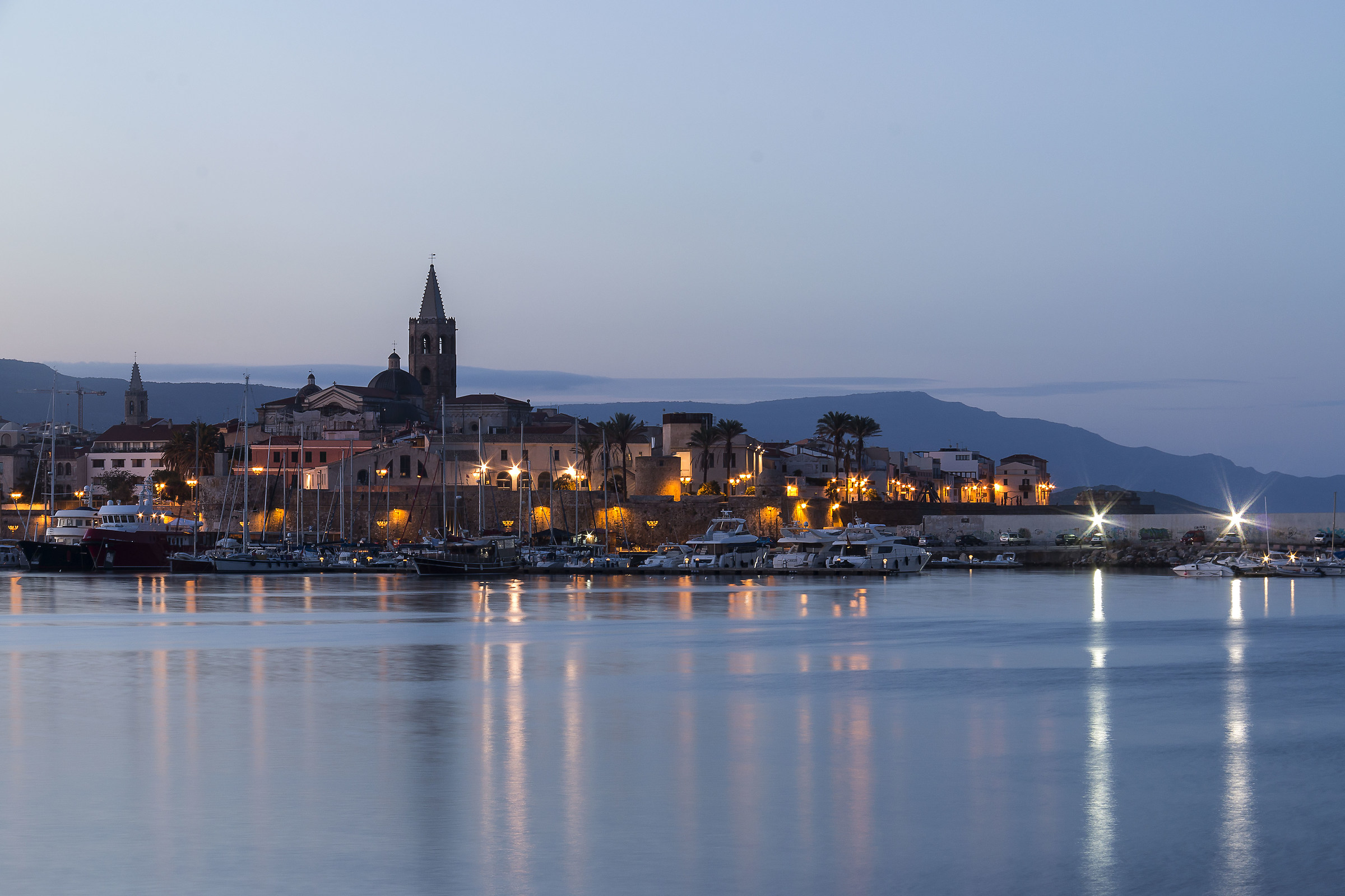 Prime luci su Alghero