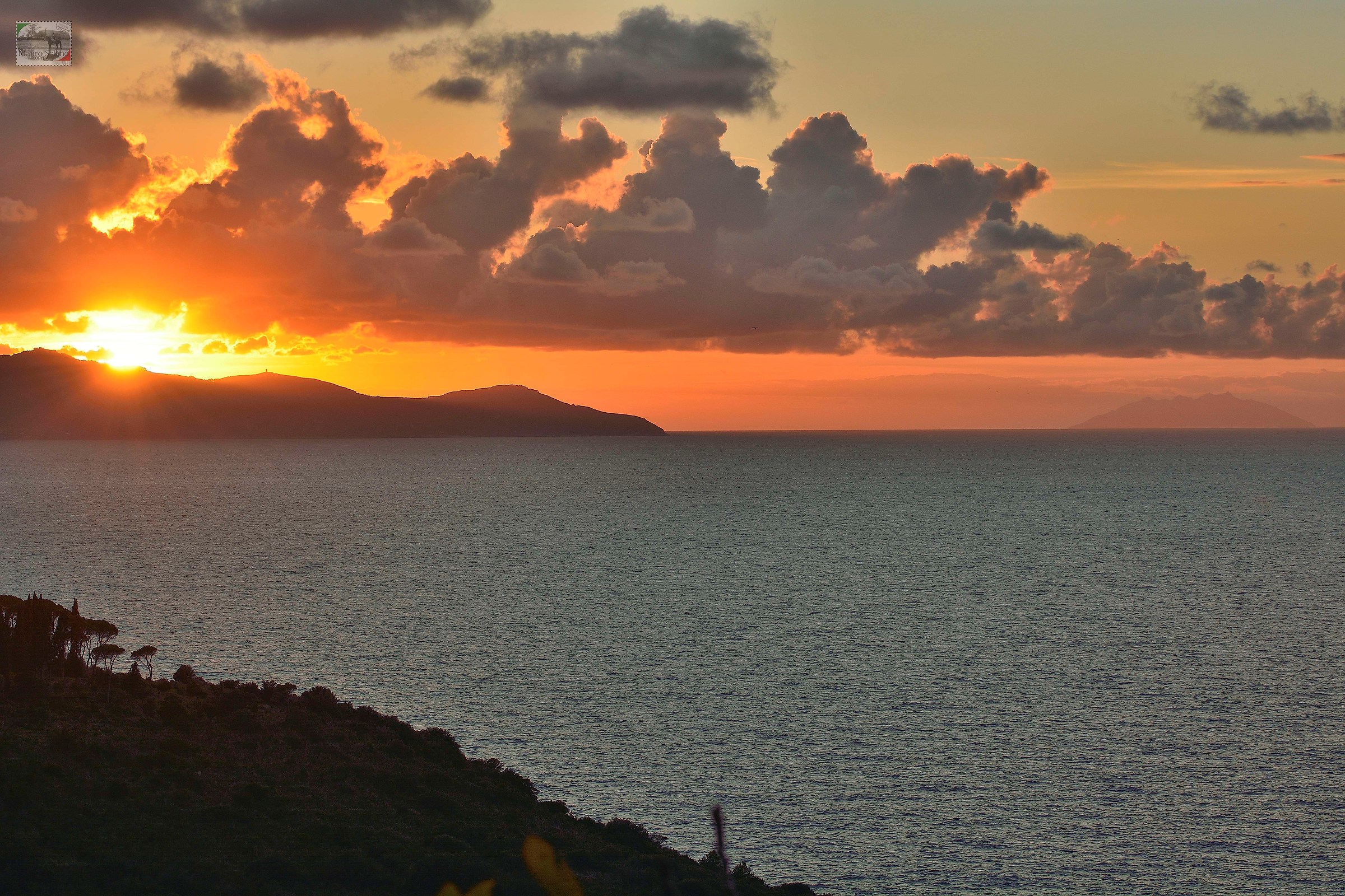sunset island of Giglio and Montecristo