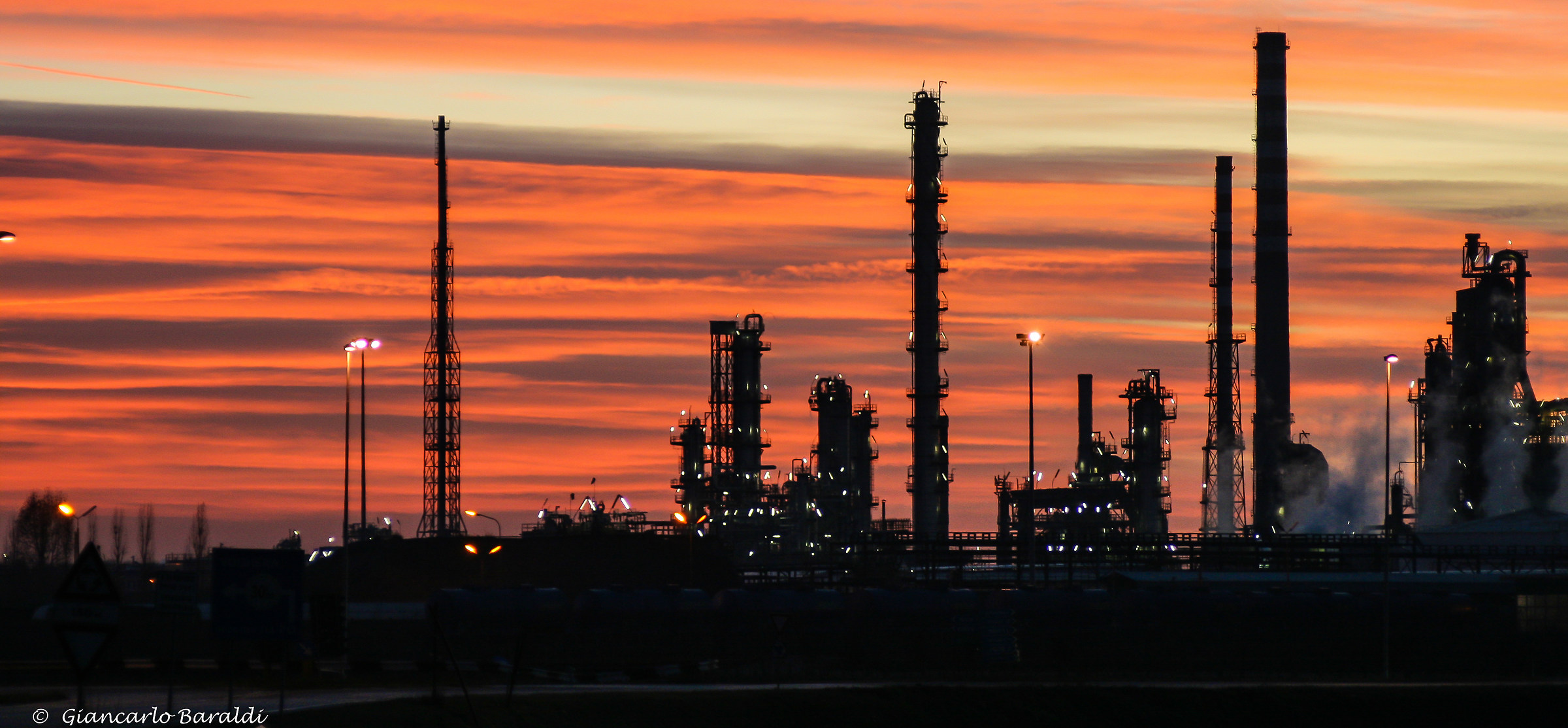 sunset in refinery