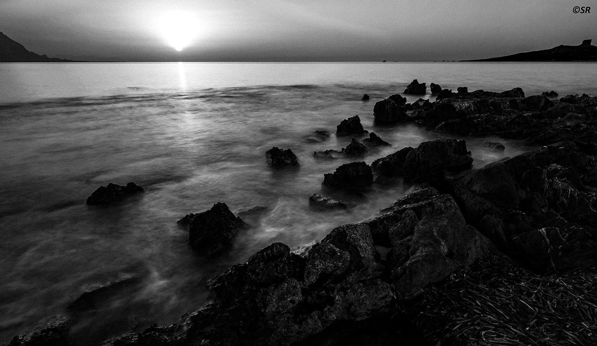 Dressed in a white silk black ..