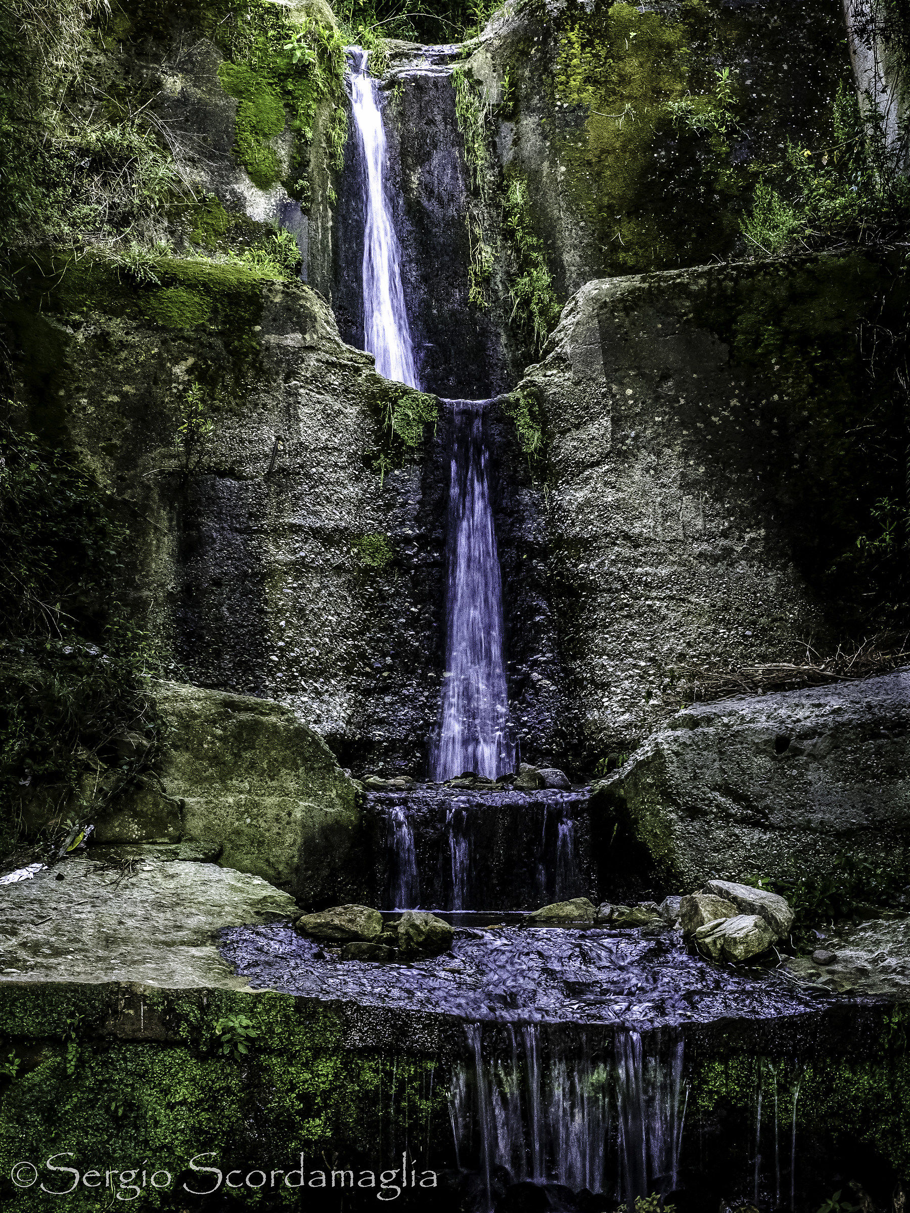 Small artificial waterfall on the banks of Chianalea