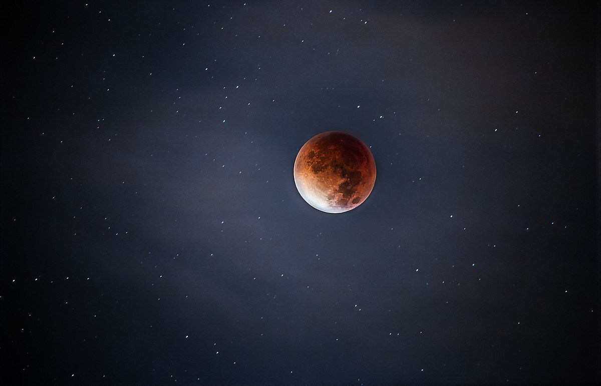 eclipse through the clouds