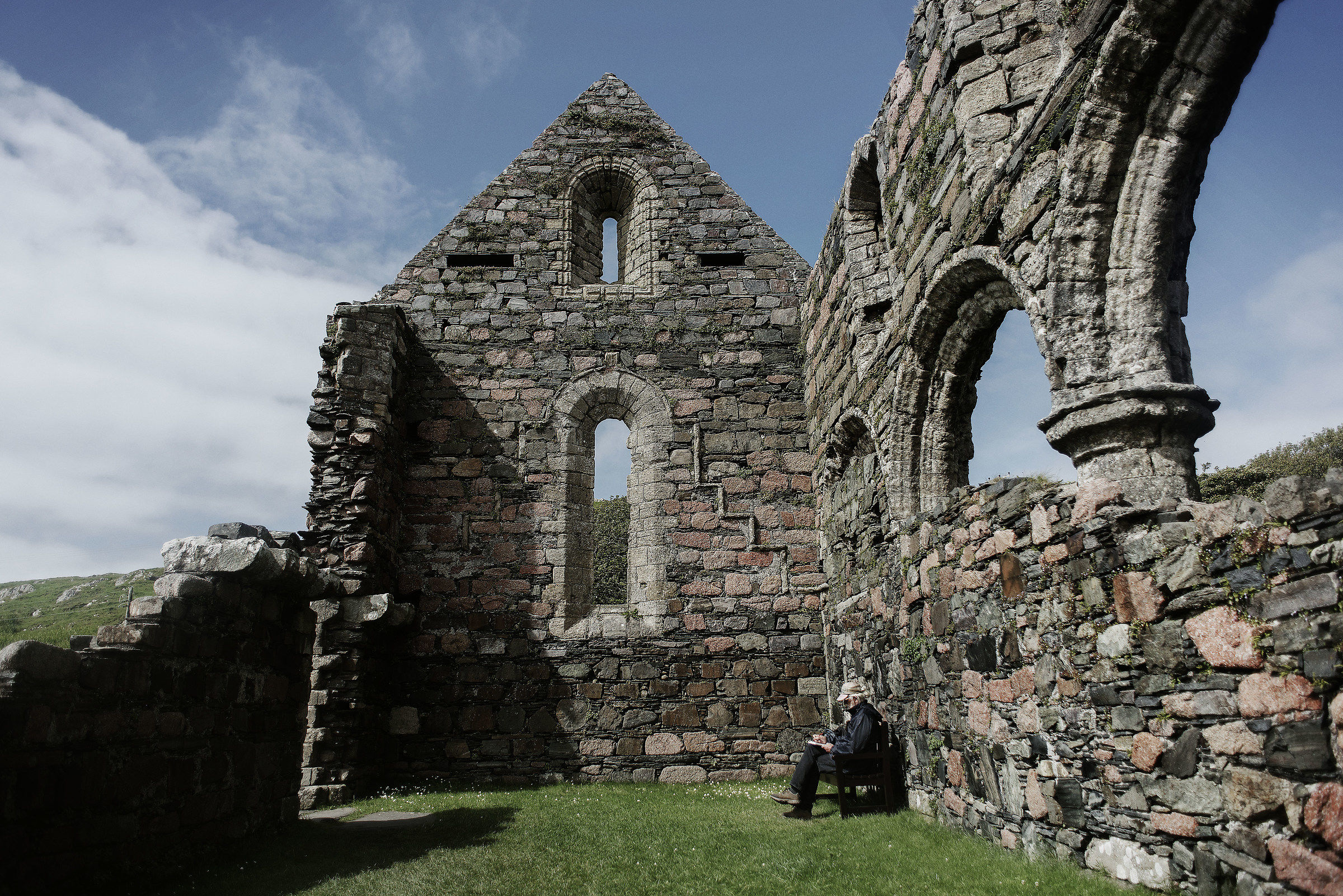 A man draws in the Isle of Iona