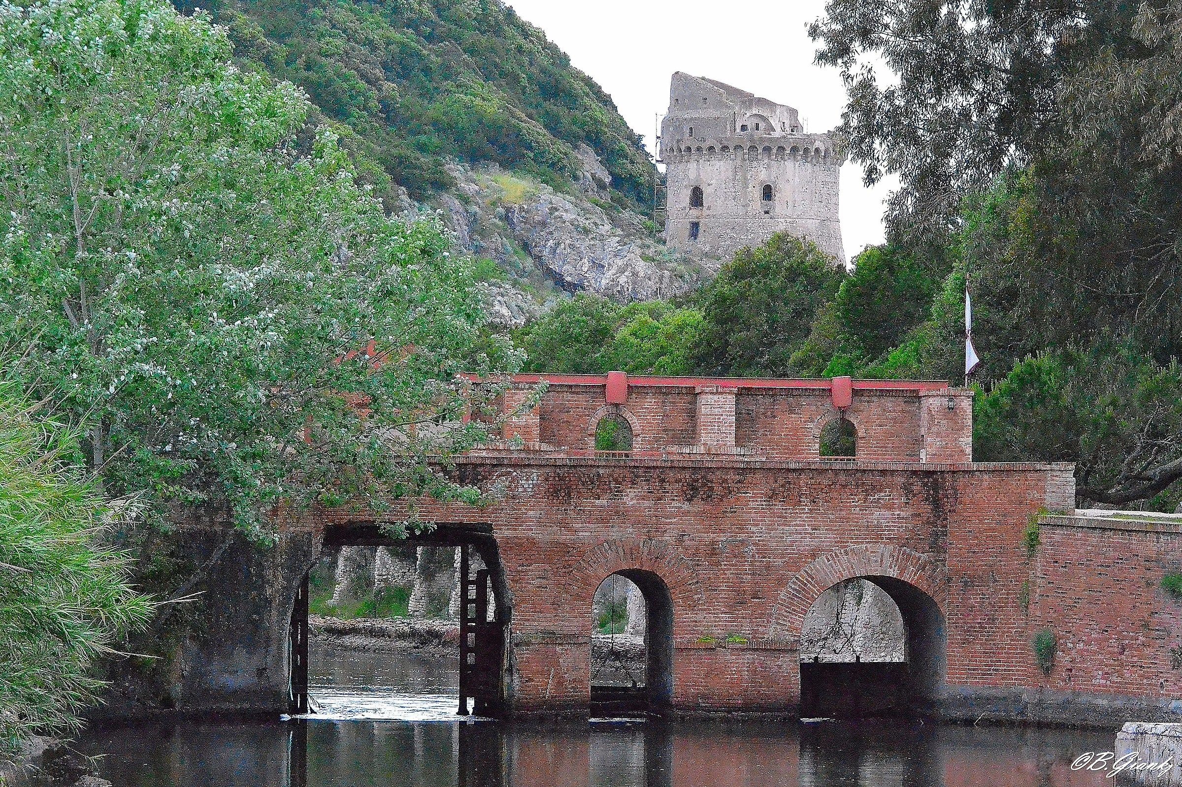 Red Bridge over the canal of the lake towards Torre Paola (l...