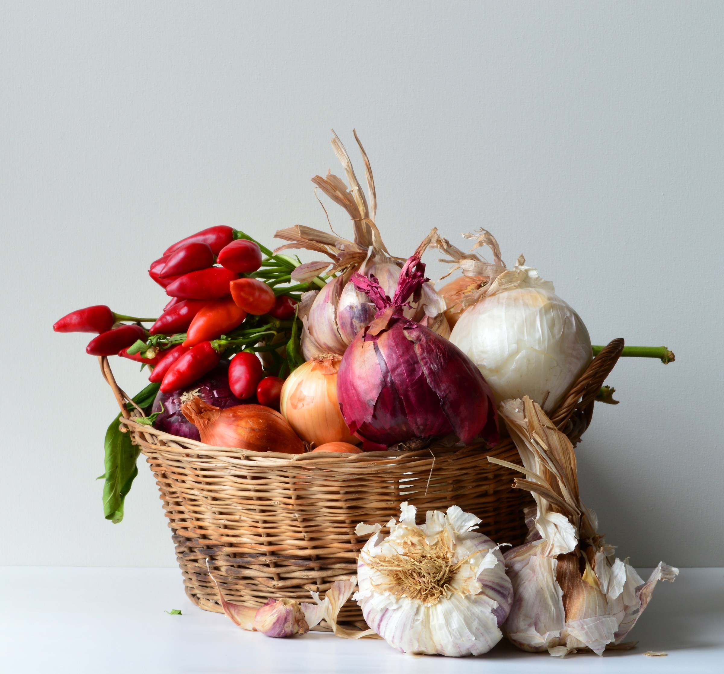 Basket with garlic and ...