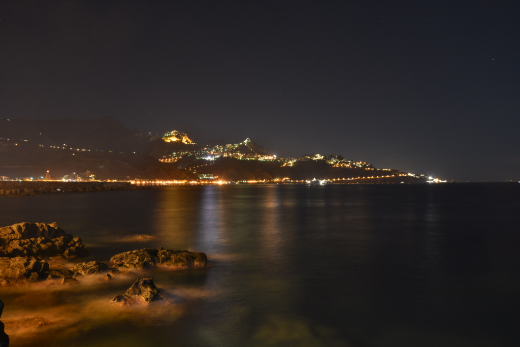 Taormina by night (view from Giardini Naxos)