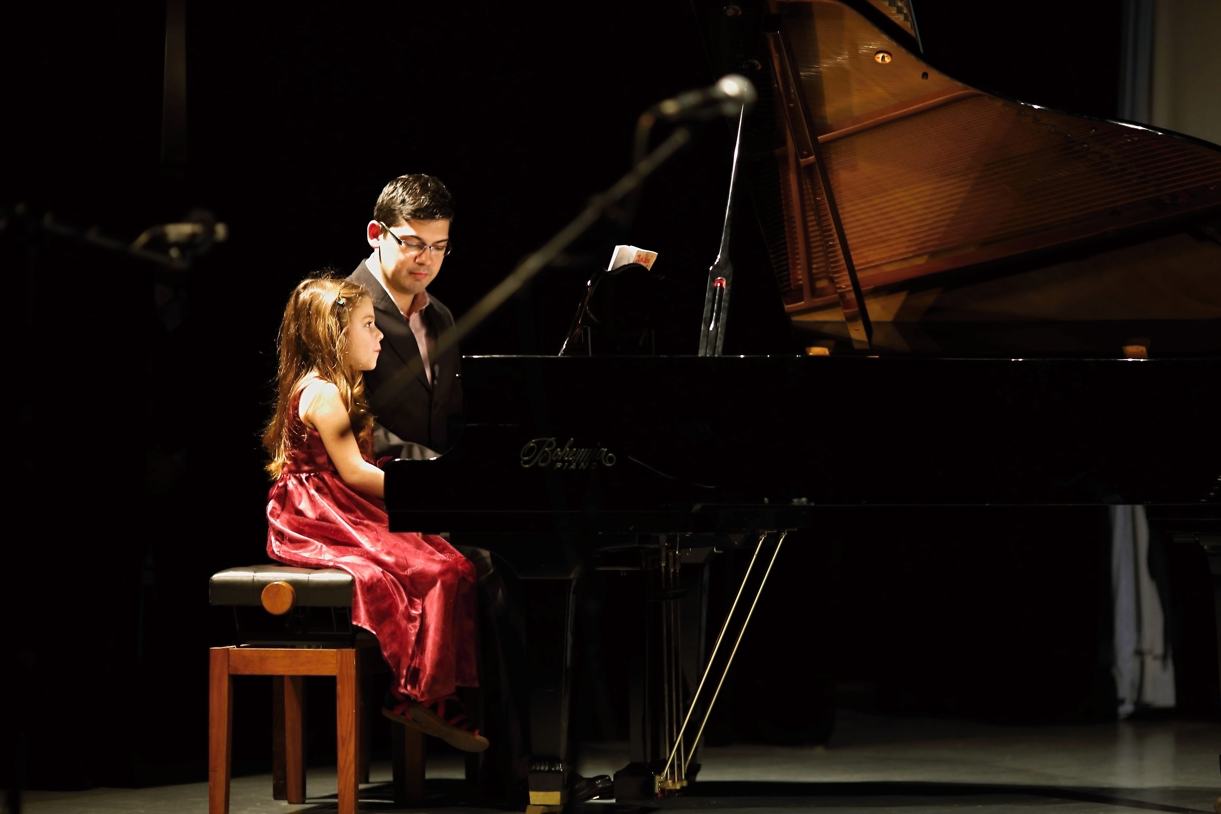 Two behind the grand piano