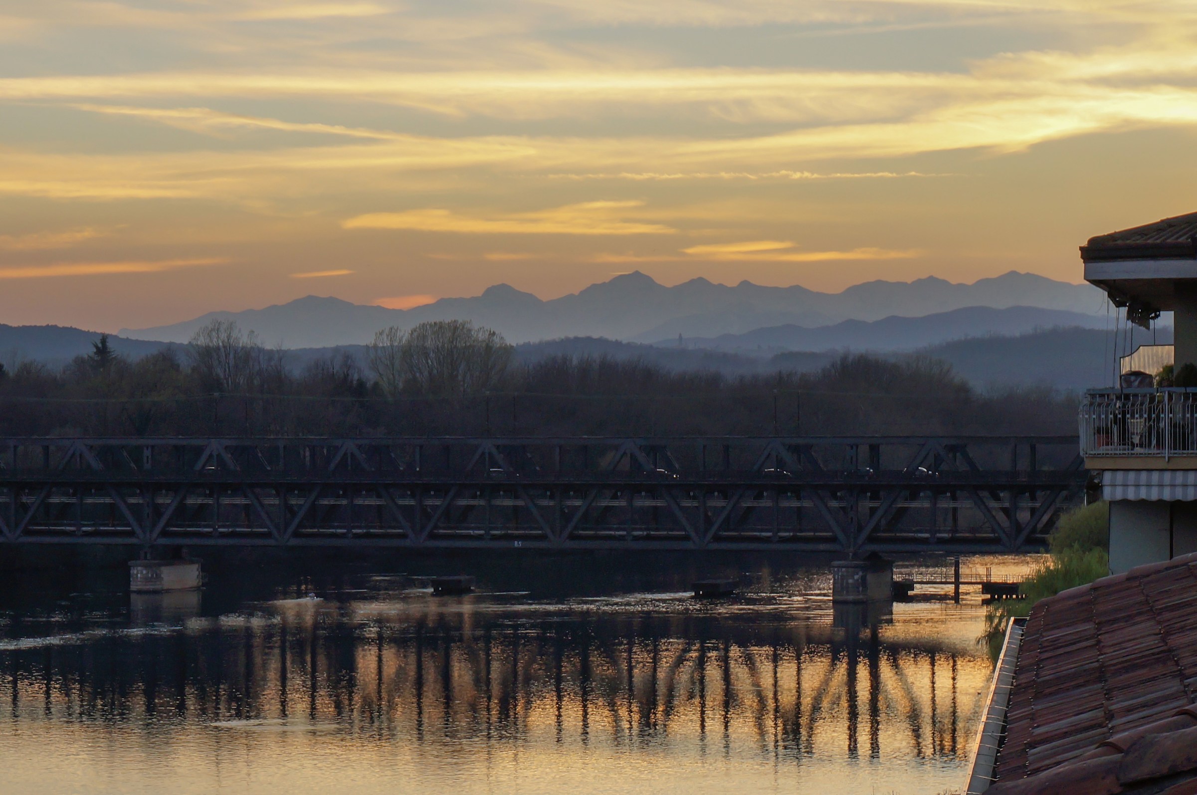 Sunset by a riverside terrace 1