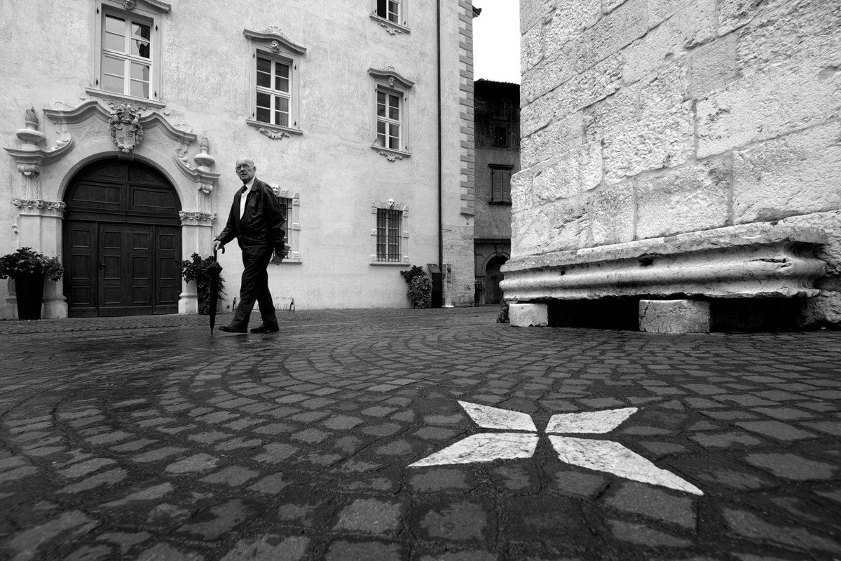 The passer with umbrella