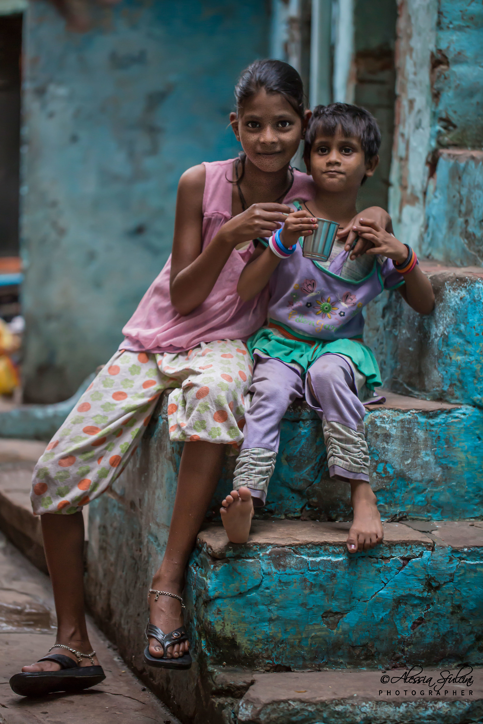 Girls playing in the colorful alleys of Varanasi