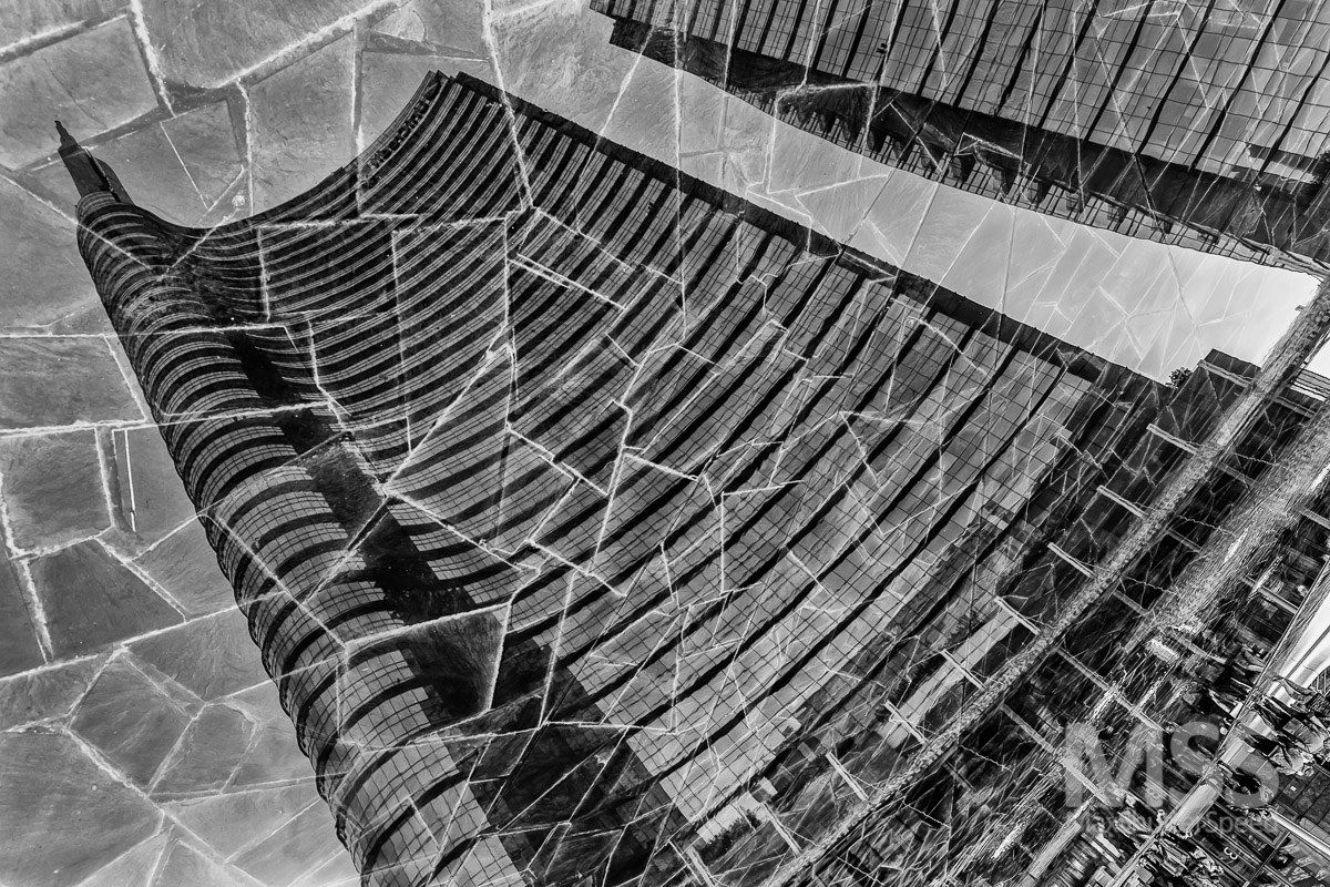 Reflections in the square Gae Aulenti