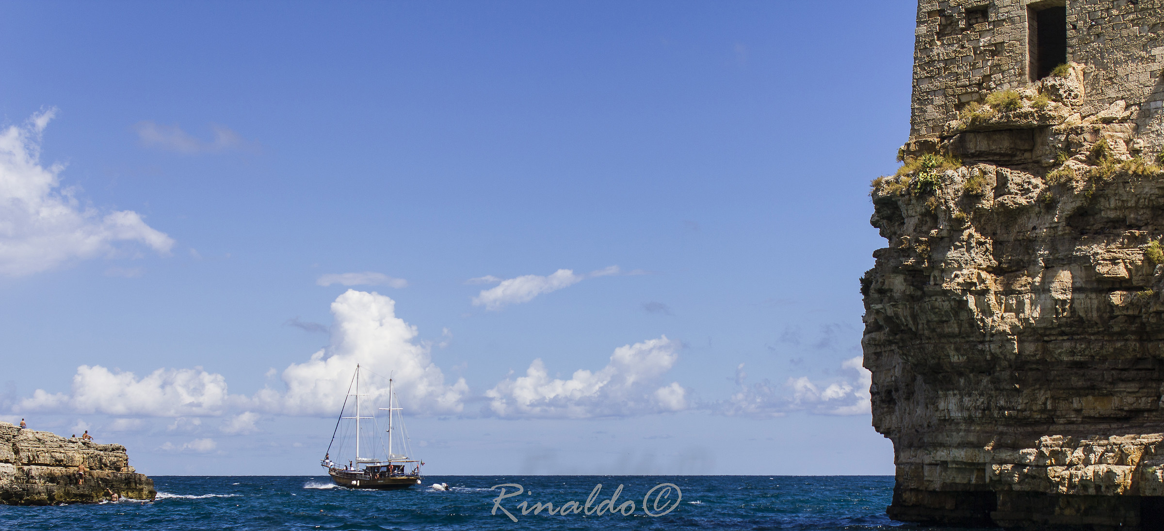 Turkish gulet is "bowing to the coast of Polignano
