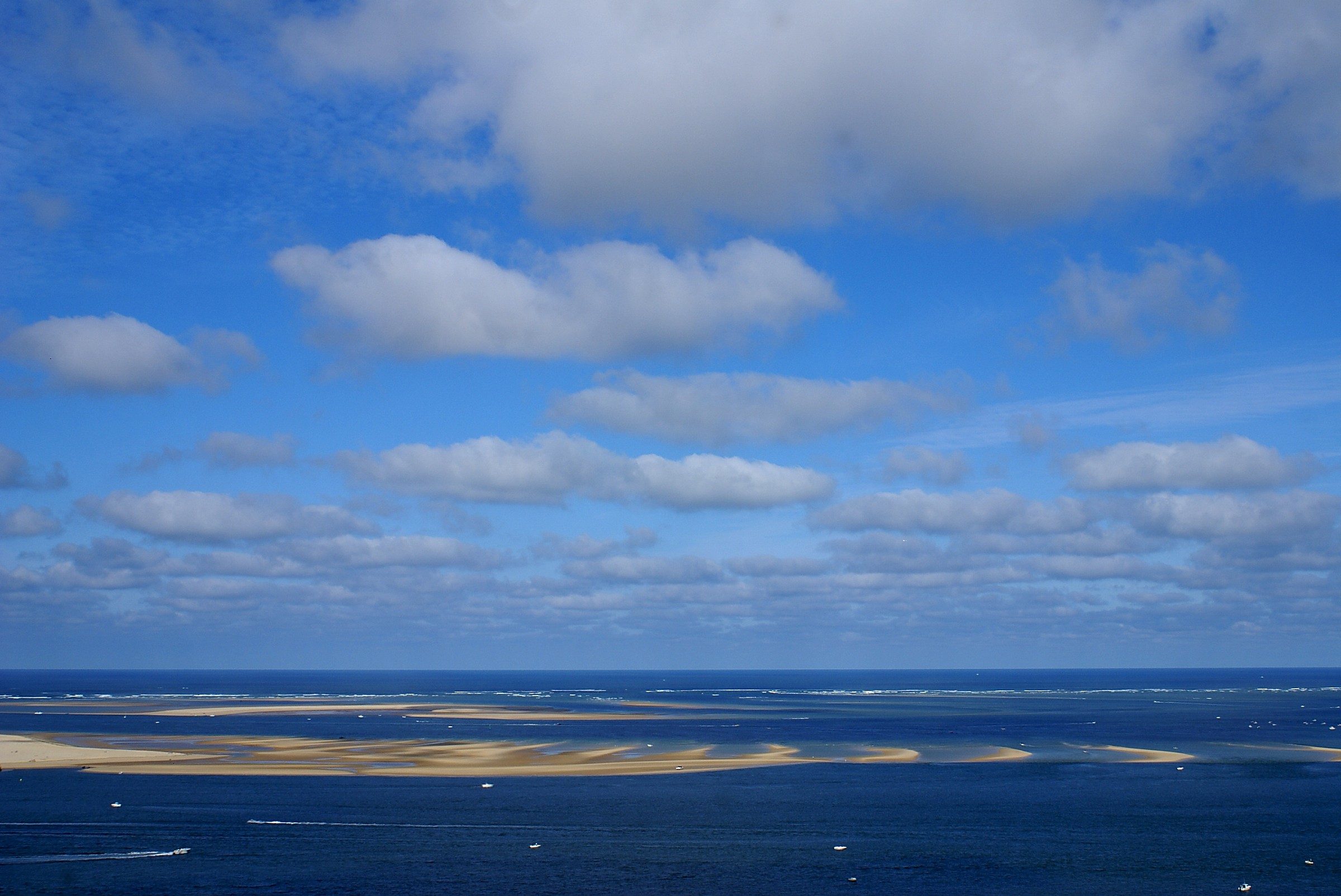 Ocean and sand play hide and seek: Banc d'Arguin