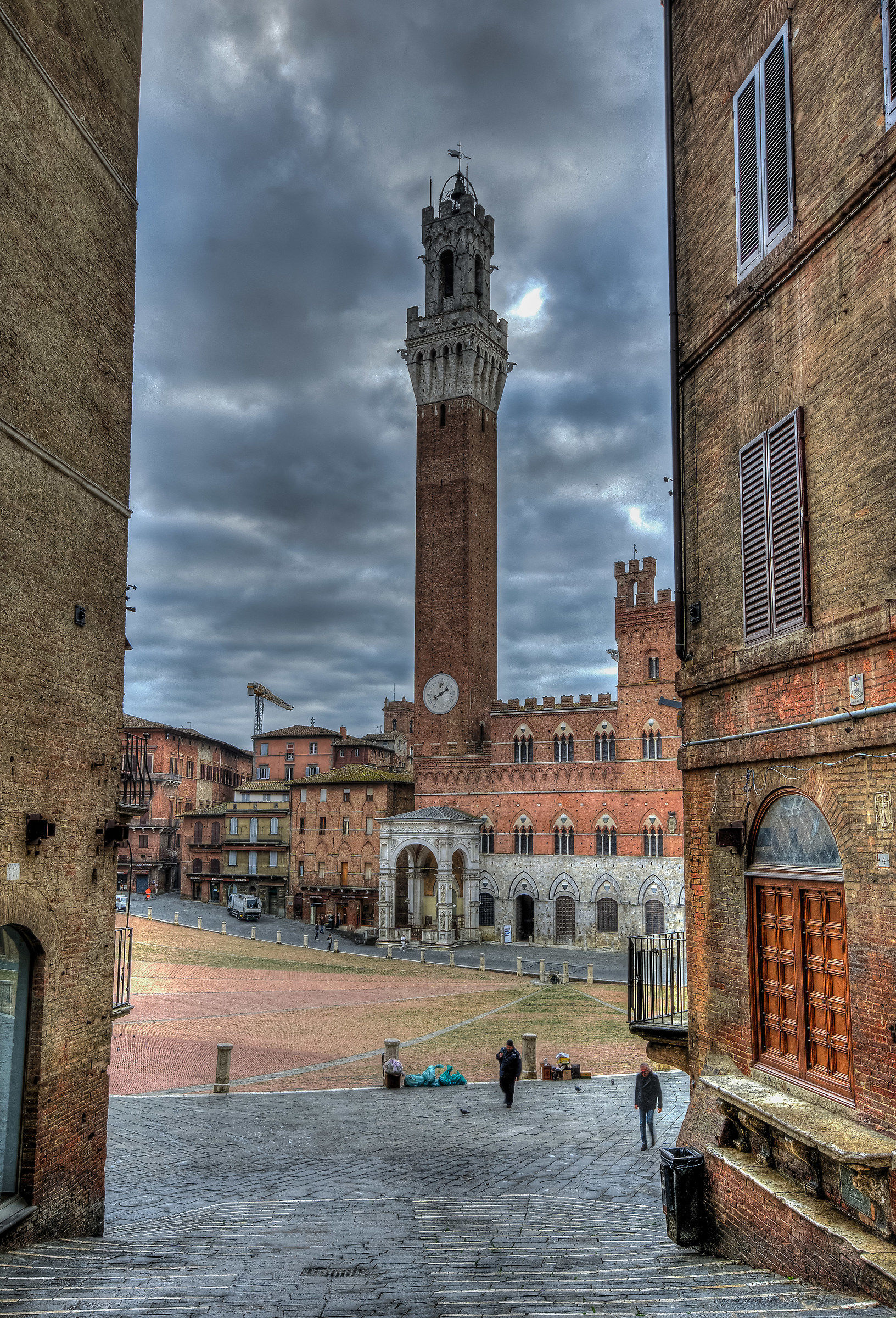 Siena wakes up under a stormy sky ...