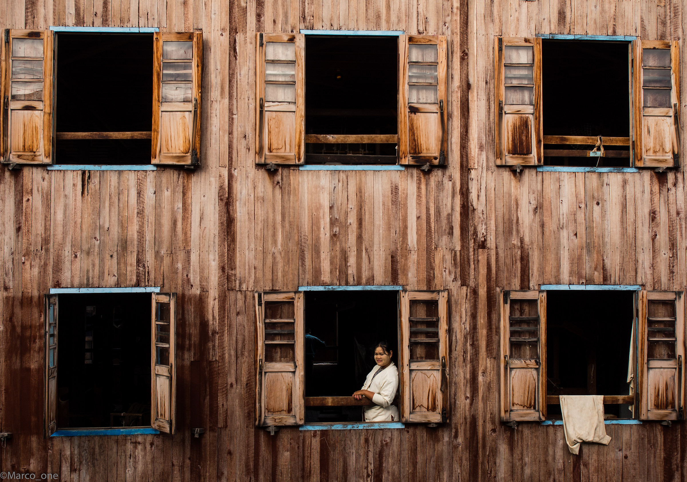 Weaver of stems of lotus flowers