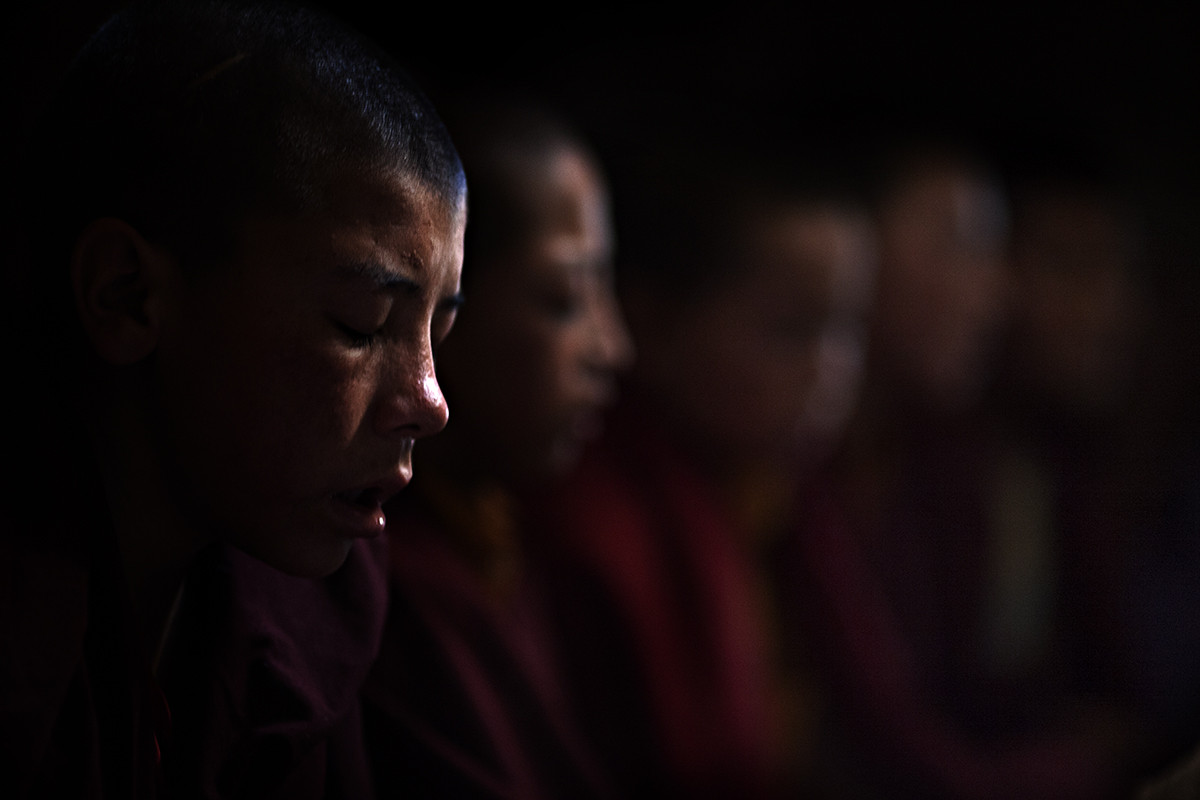 Tibetan monks praying ..
