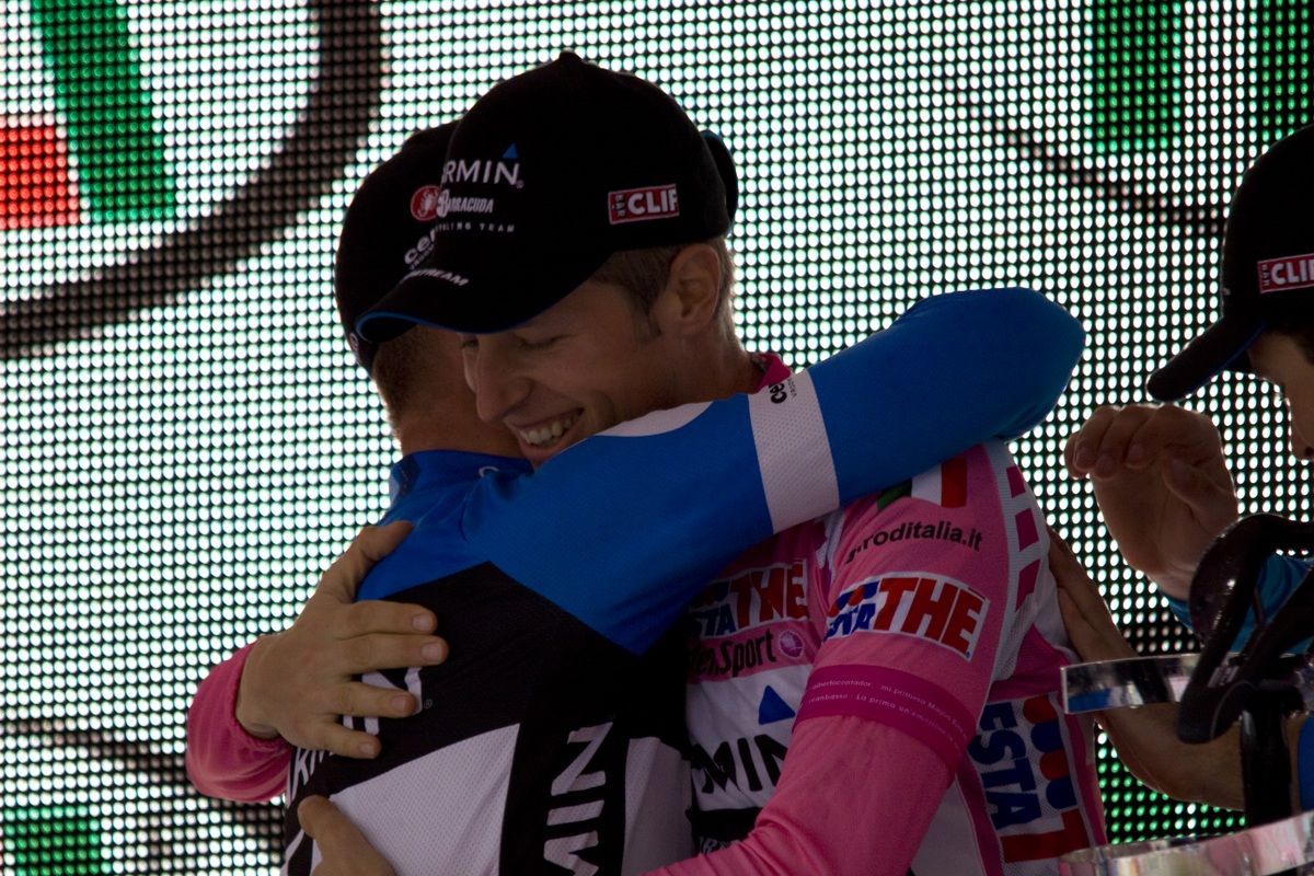 Ryder Hesjedal embraces a teammate