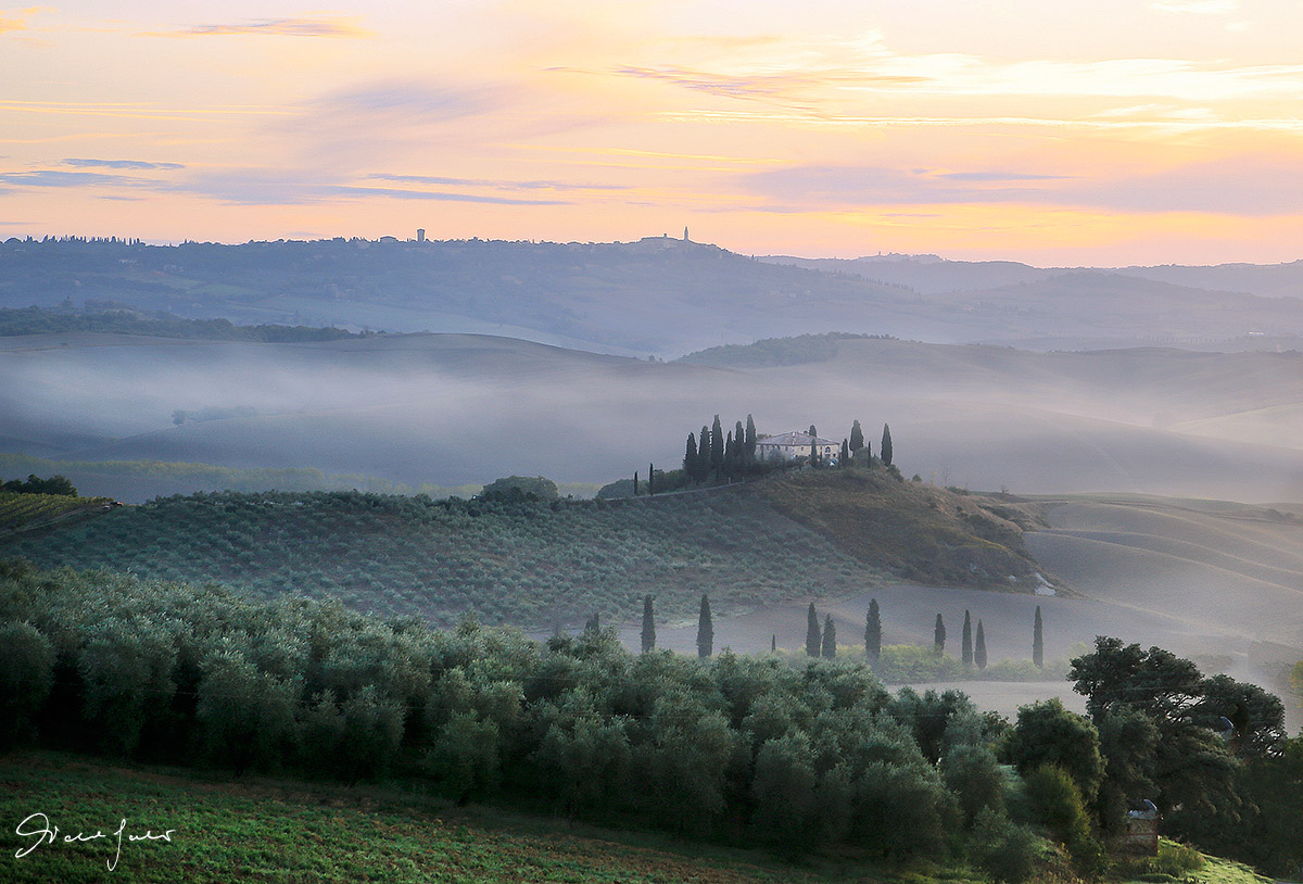 Sunrise on Podere Belvedere in Val d'Orcia