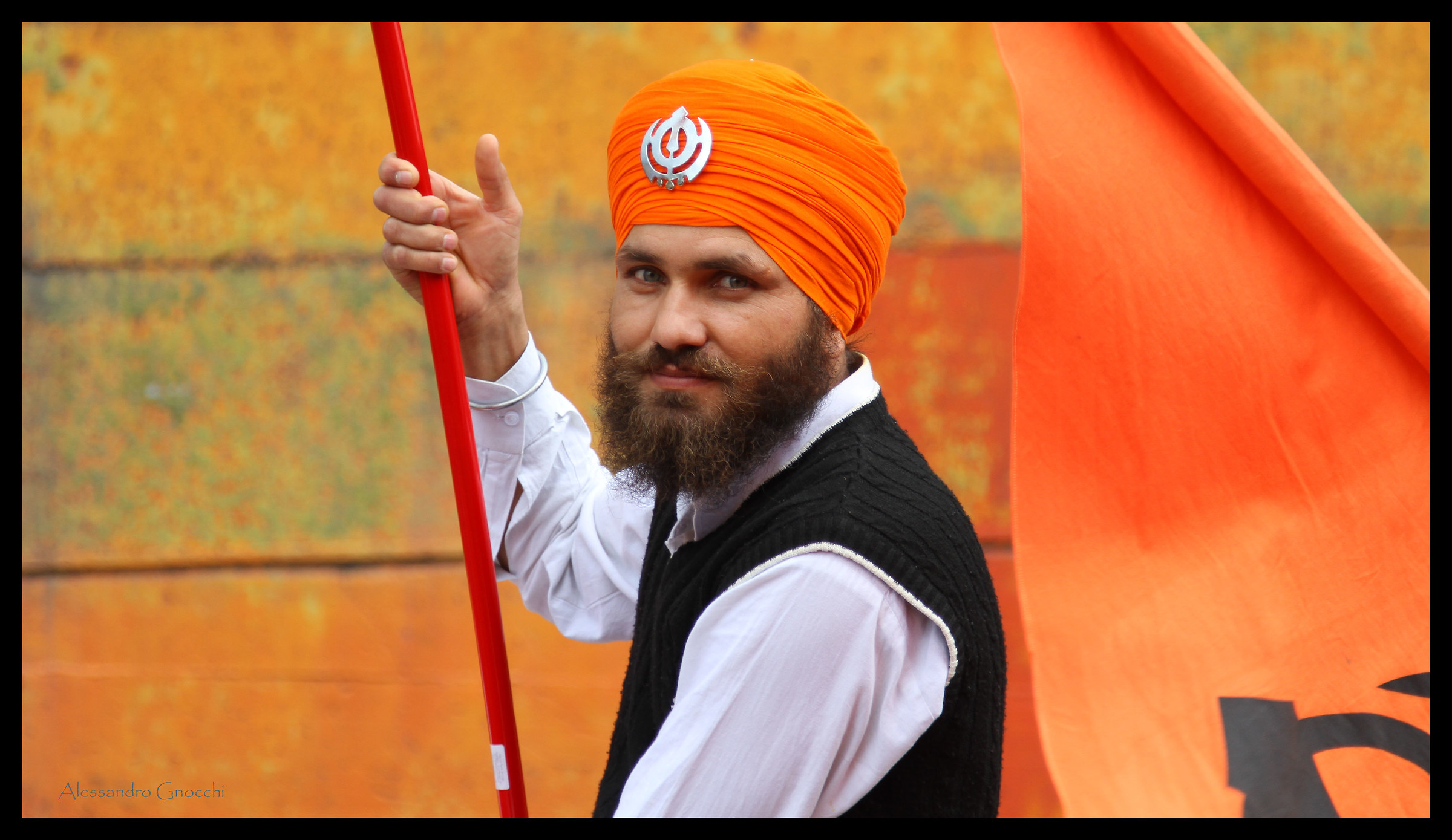 Sbandieratore on orange background