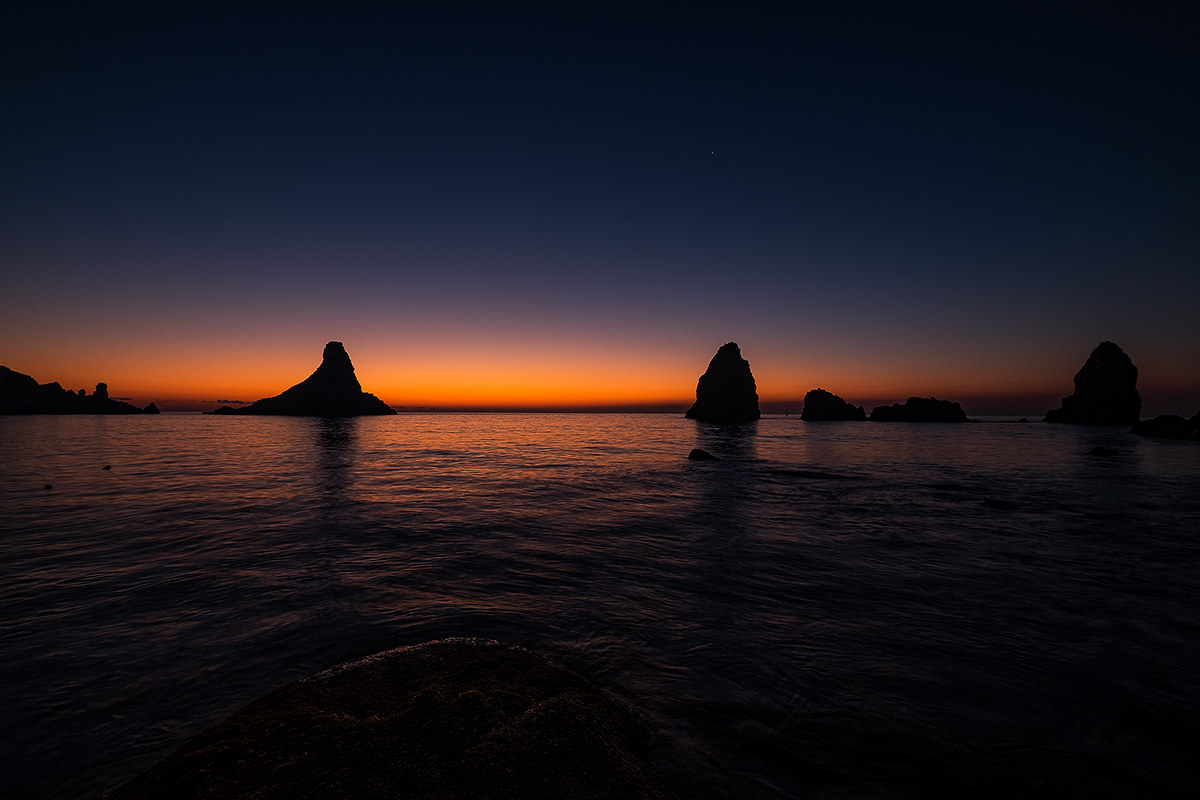 Sunrise over the Faraglioni-bis