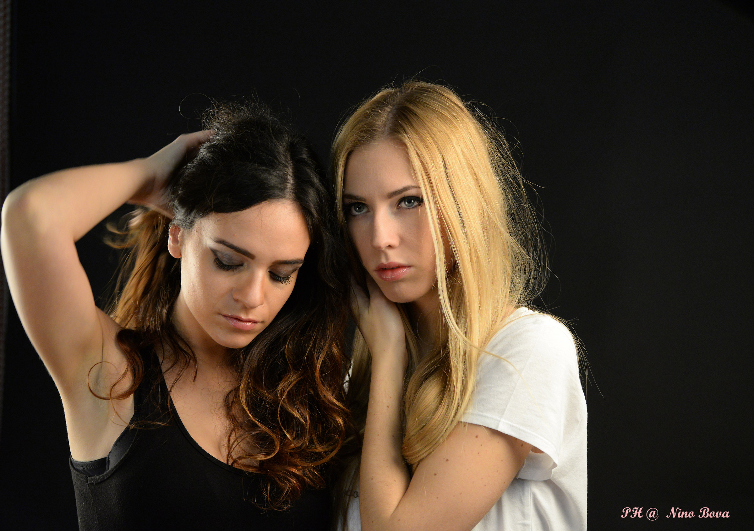 La Mora and the Blonde in room laying Marvin