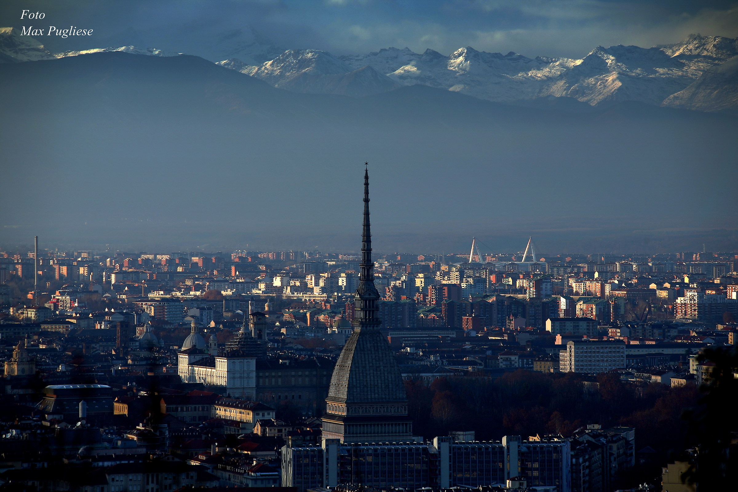 The mountains behind the city