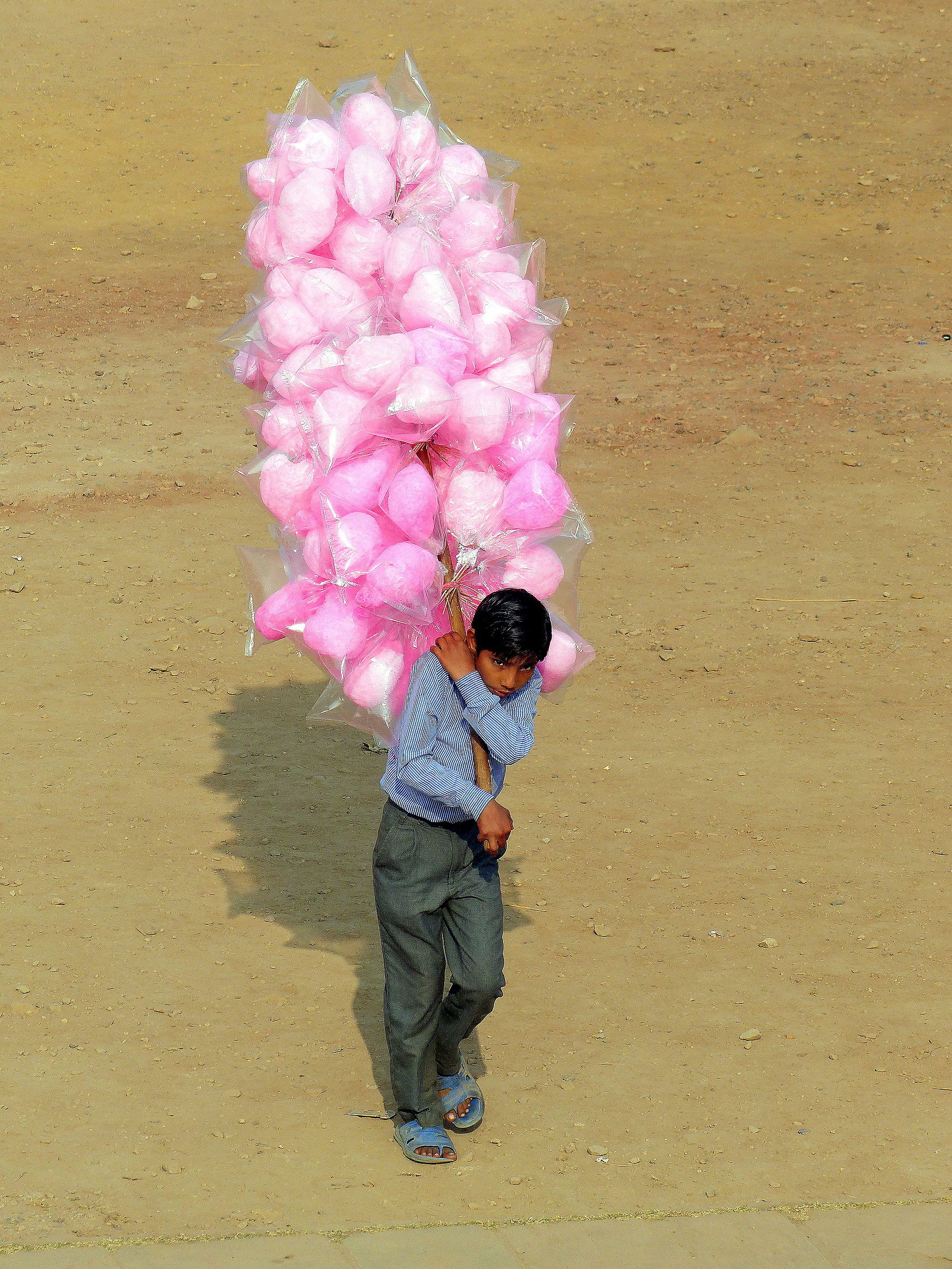 Young seller of cotton candy