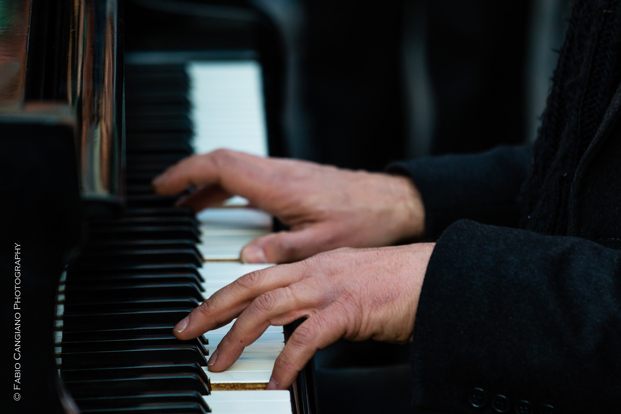 Hands and piano