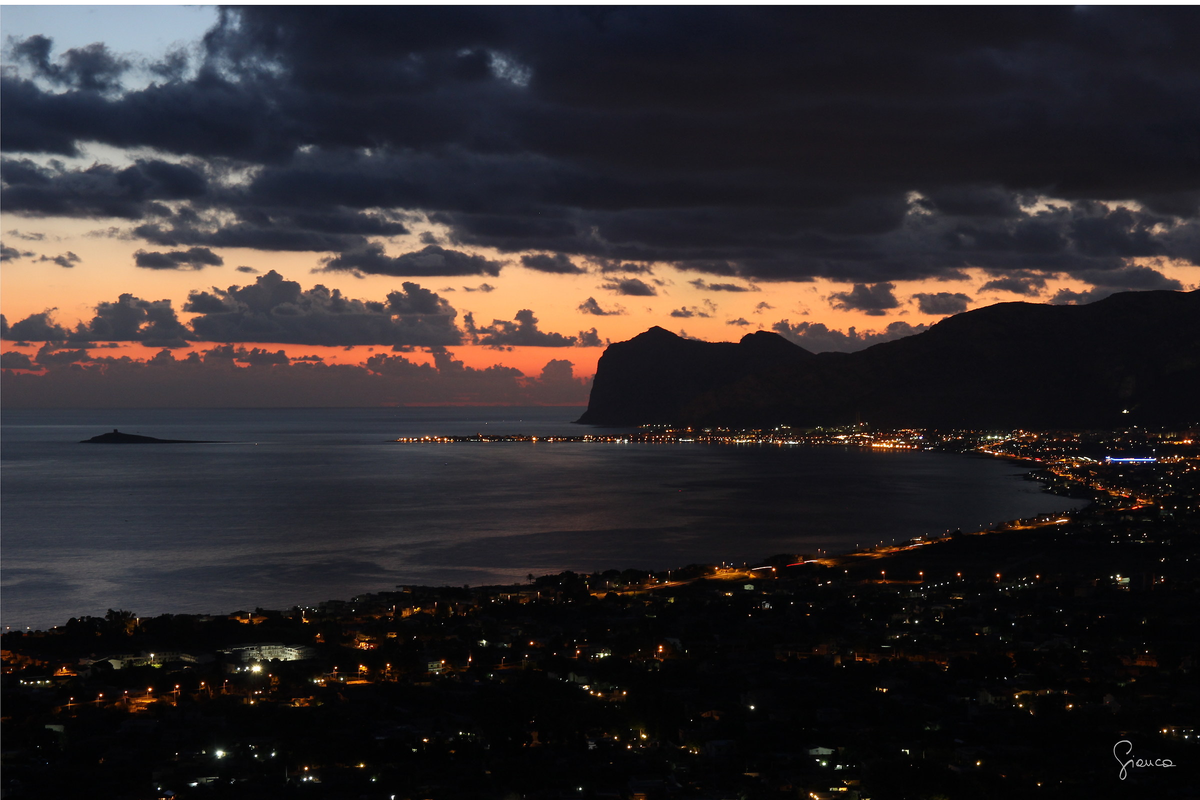 Aurora behind the Gulf of Carini