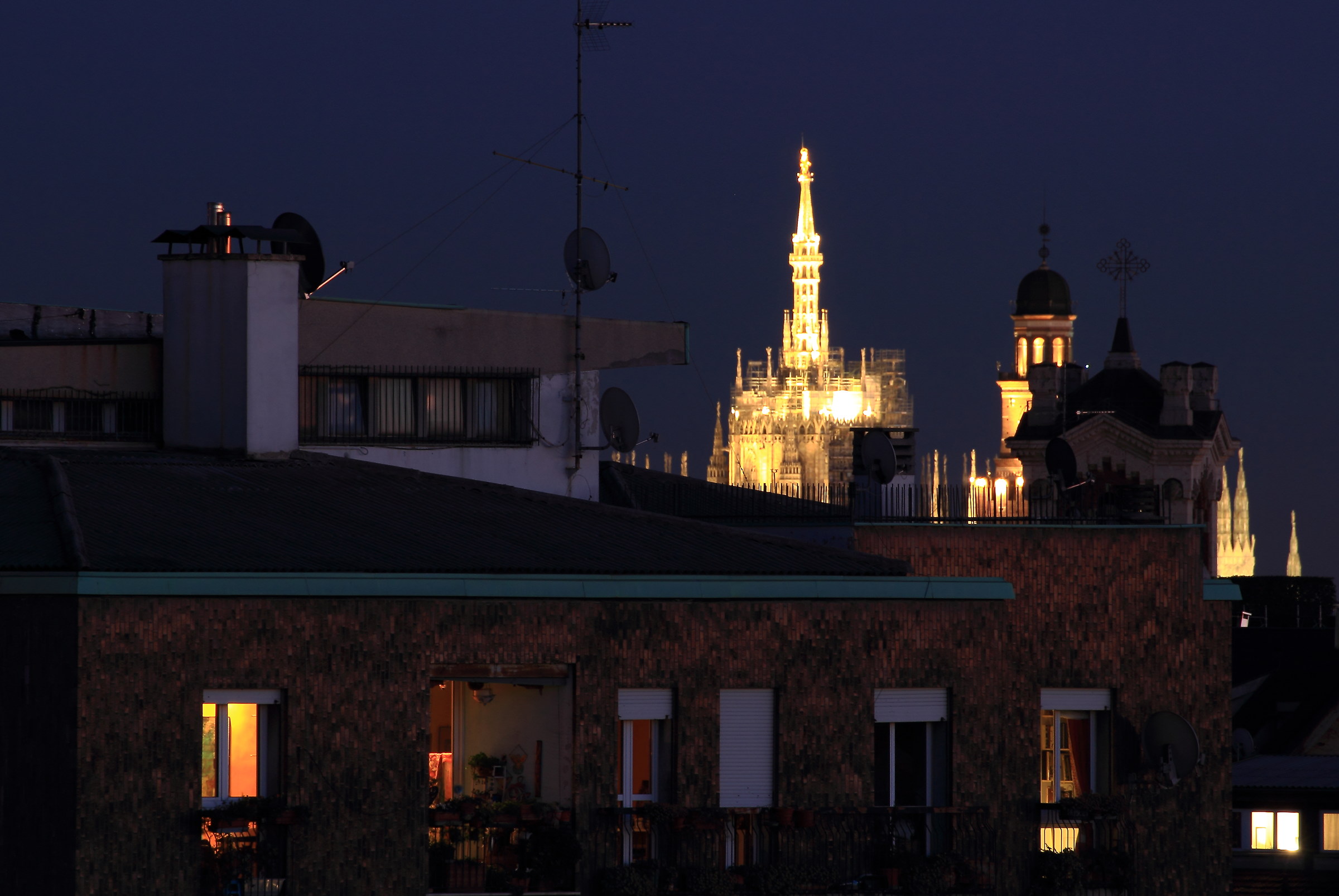 Corpus Christi Cathedral and Milan in the evening