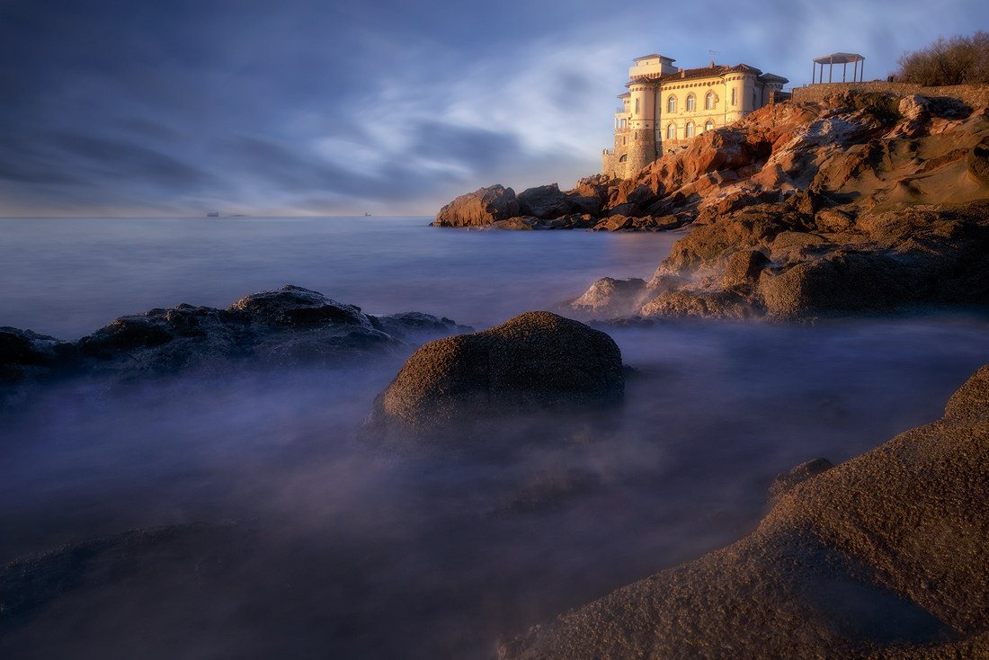 Sunset at the castle on the sea