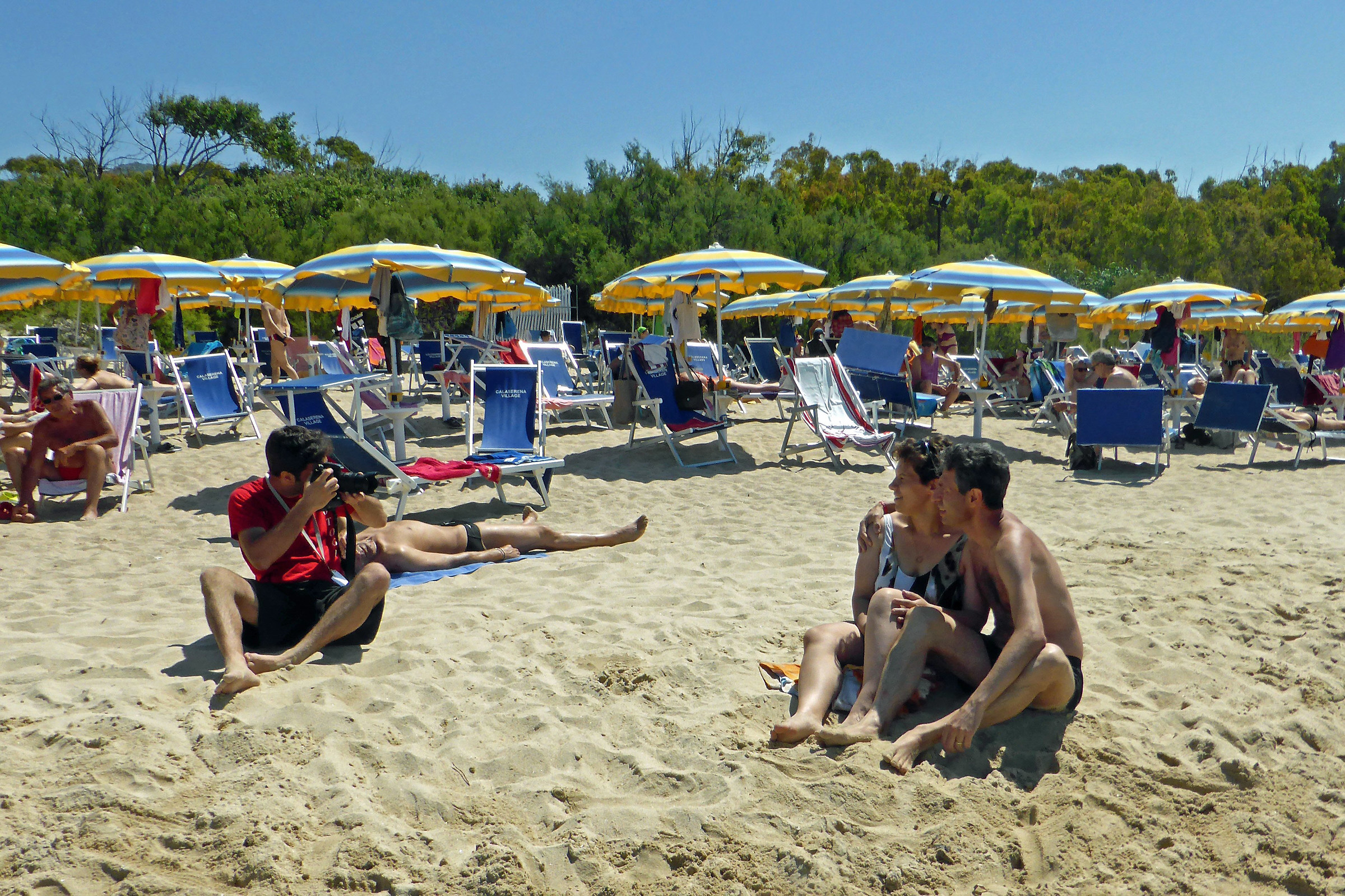 Photographer and tourists