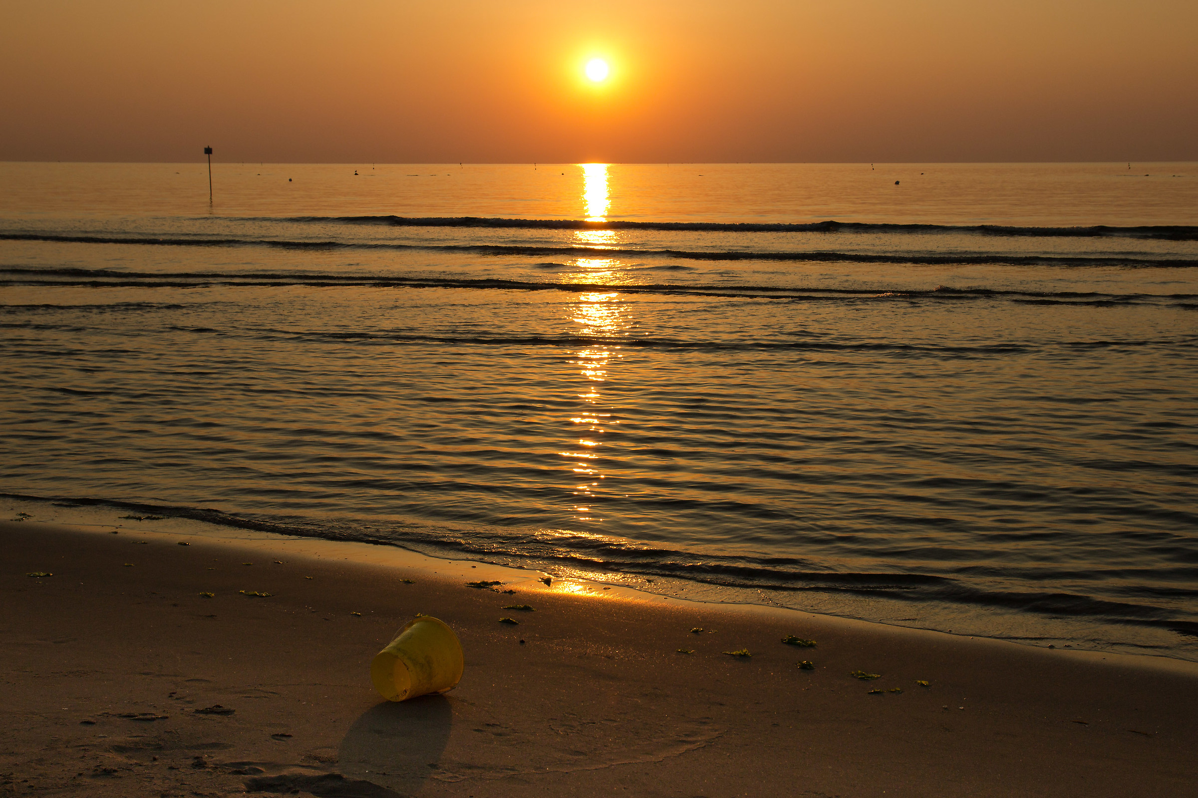 dawn beach with bucket