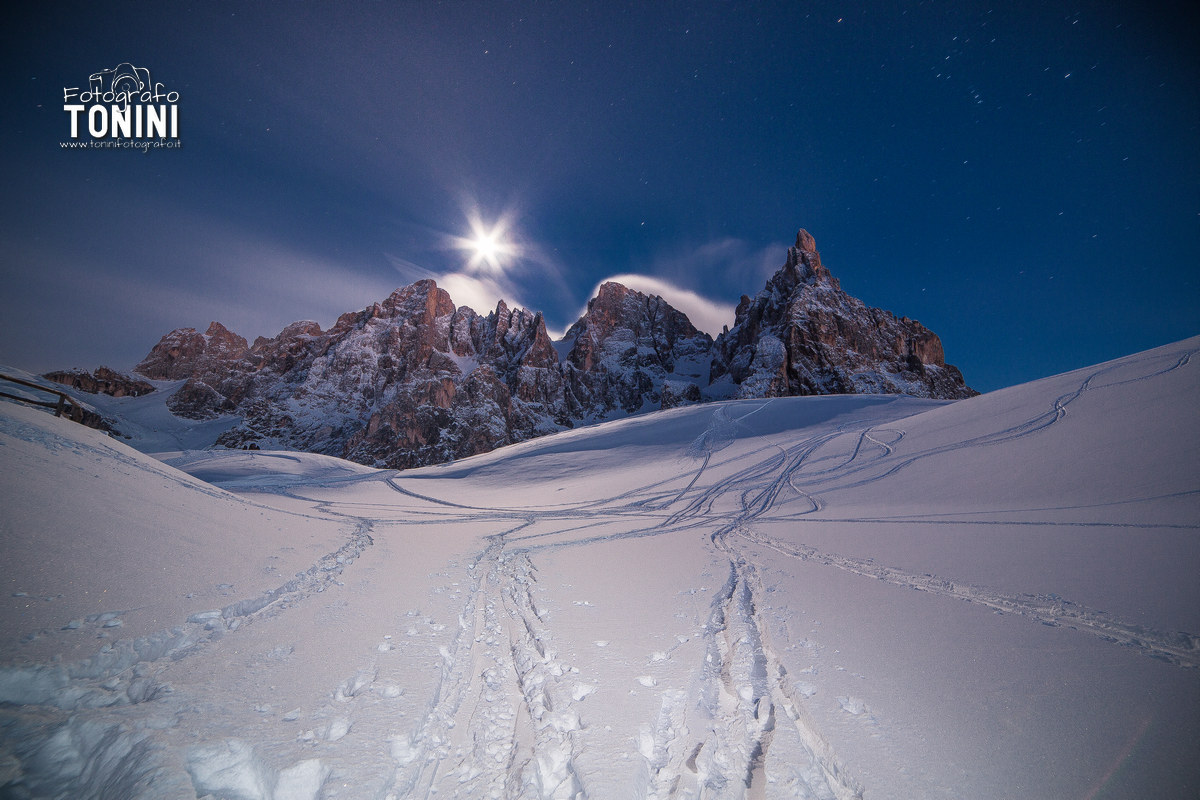 Above the snow-covered lake