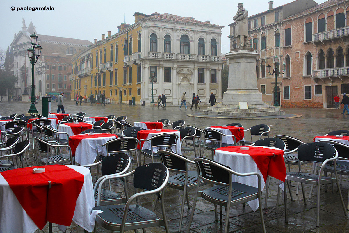 red tables in a foggy day