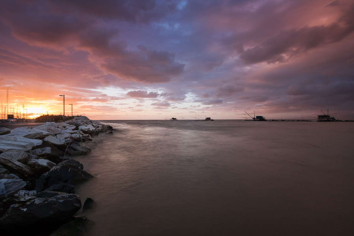 Sunset between the river and the sea