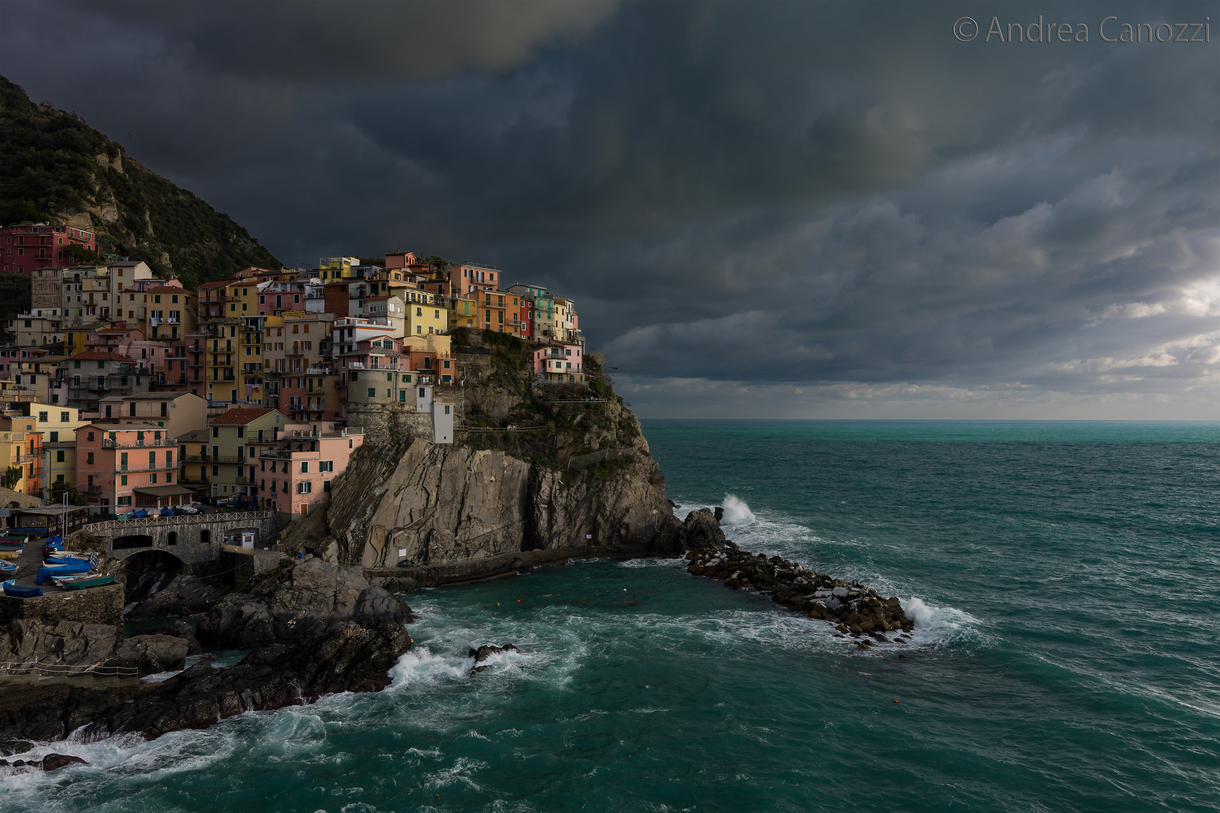 Manarola in a dark suit