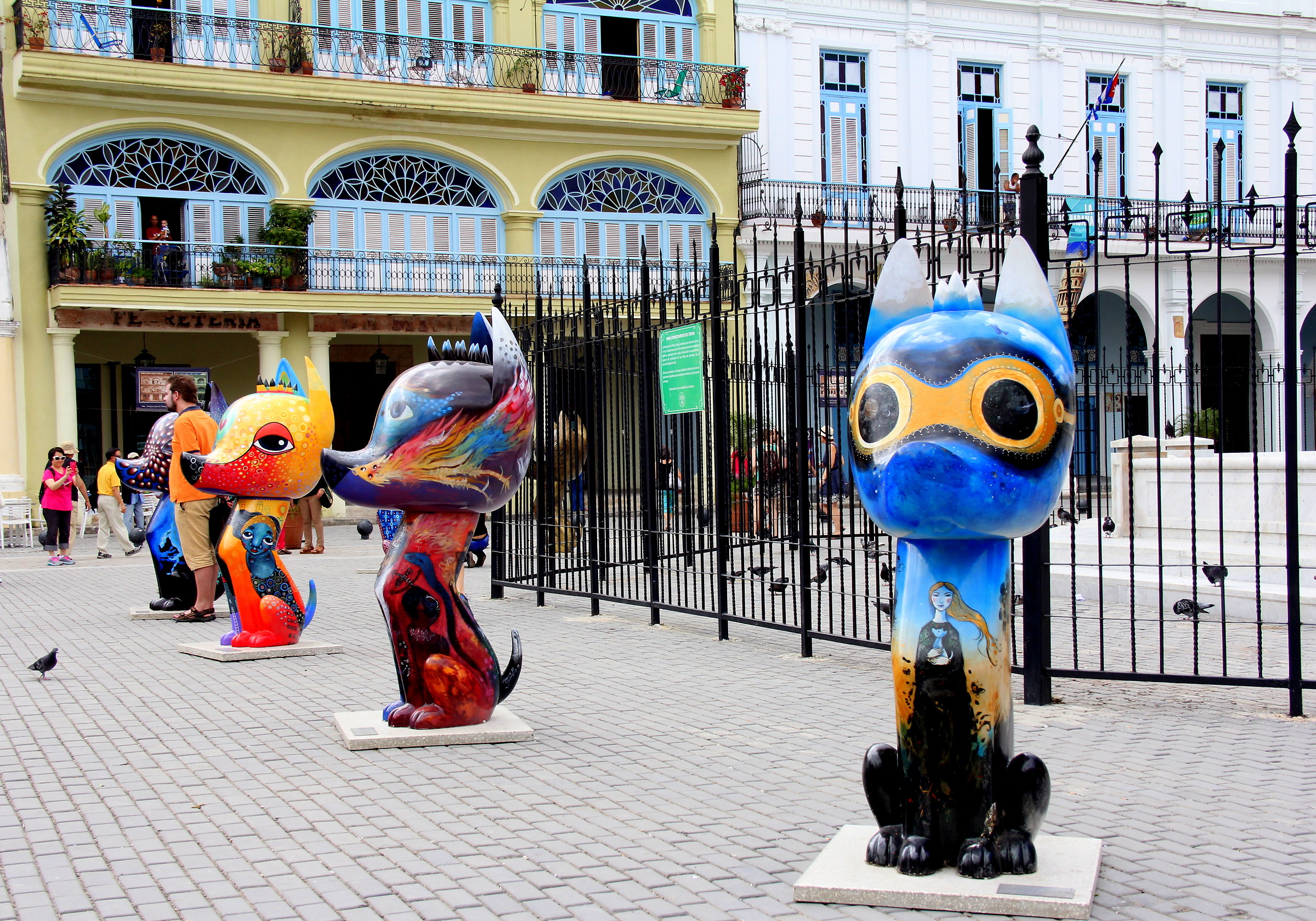 Sculptures of cats of various artists