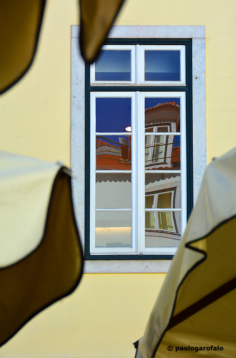 Reflections from under the umbrellas